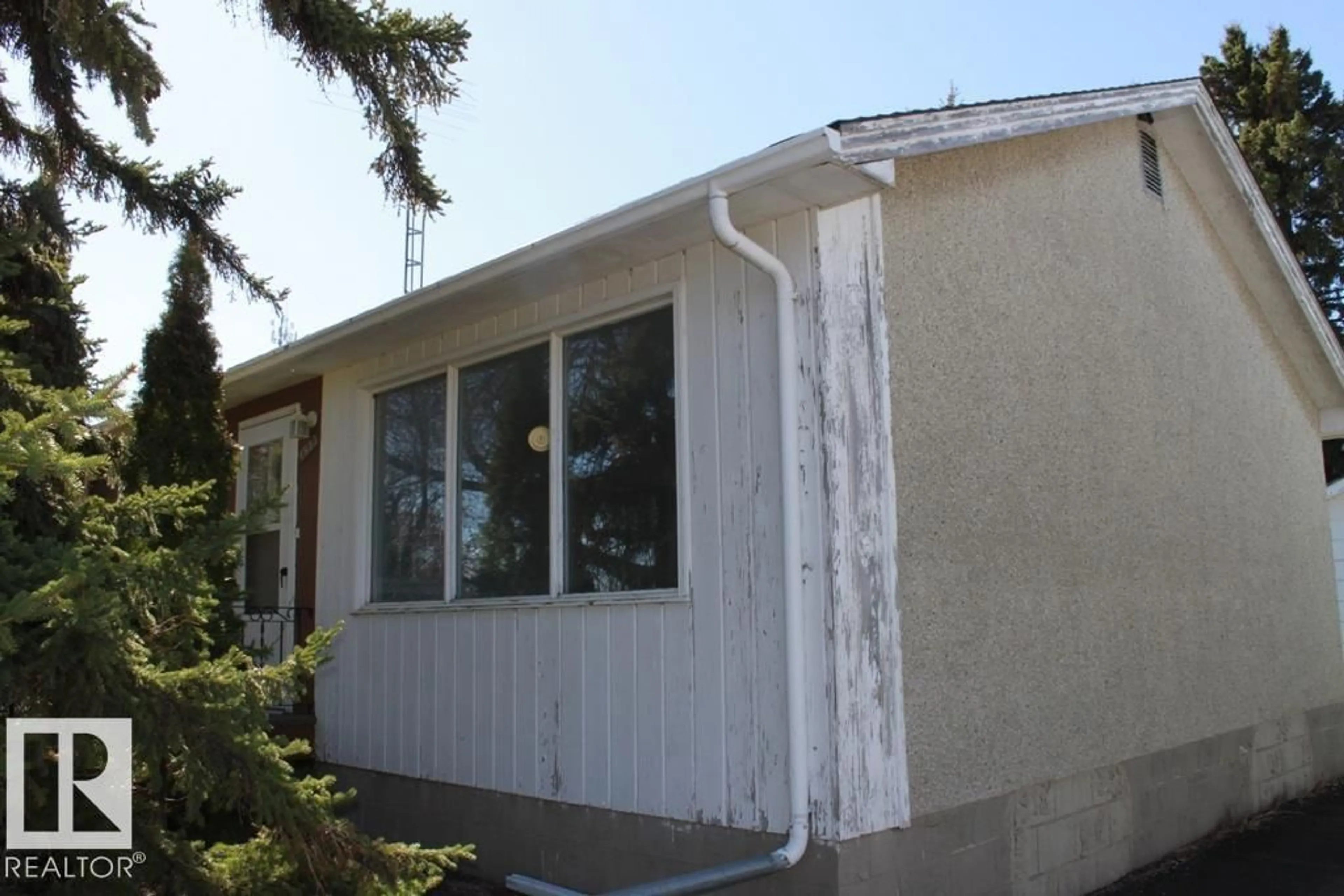 Home with vinyl exterior material, building for 4823 55 AV, Tofield Alberta T0B4J0
