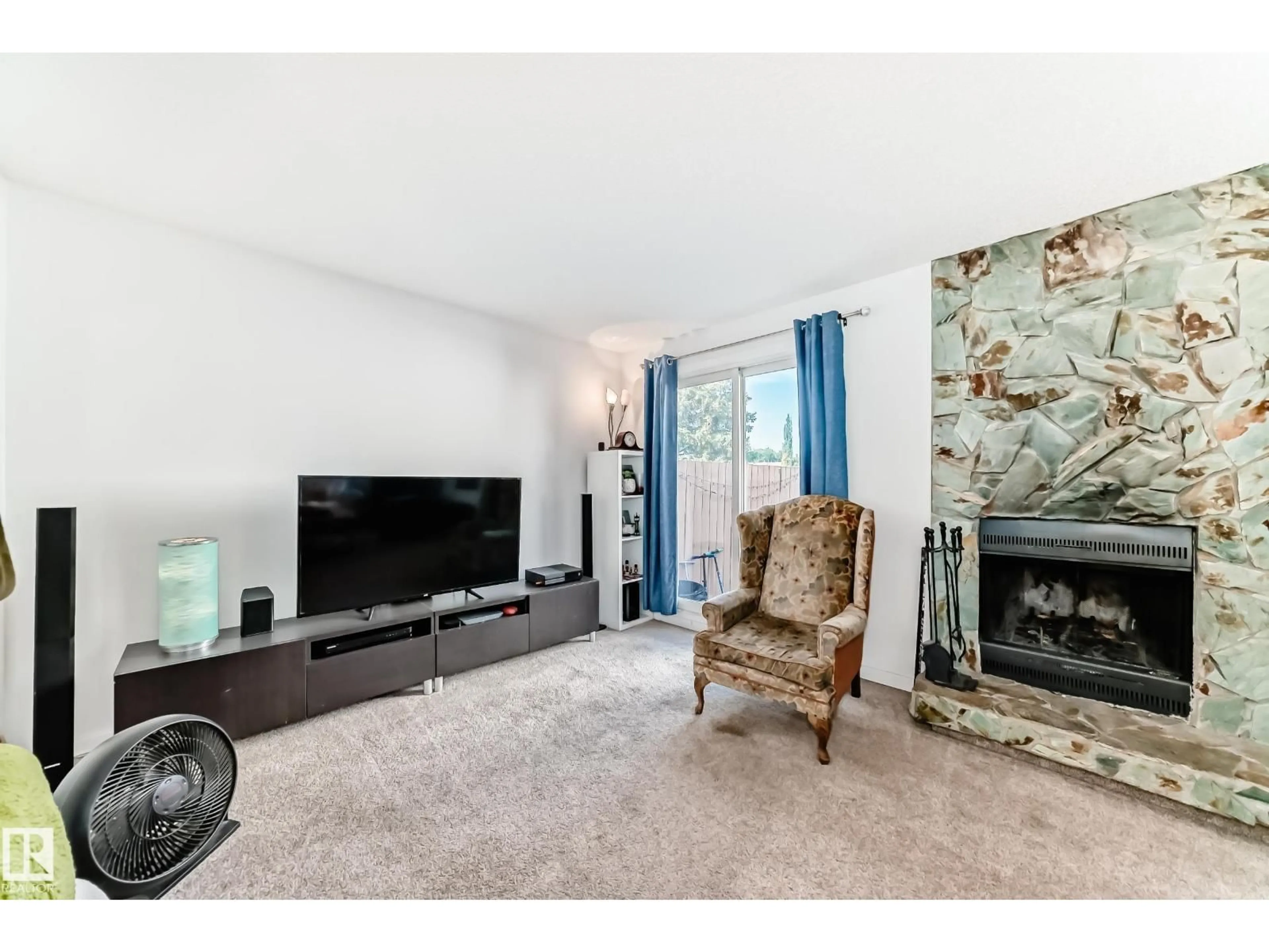 Living room with furniture, unknown for 18611 66 AV, Edmonton Alberta T5T2M3