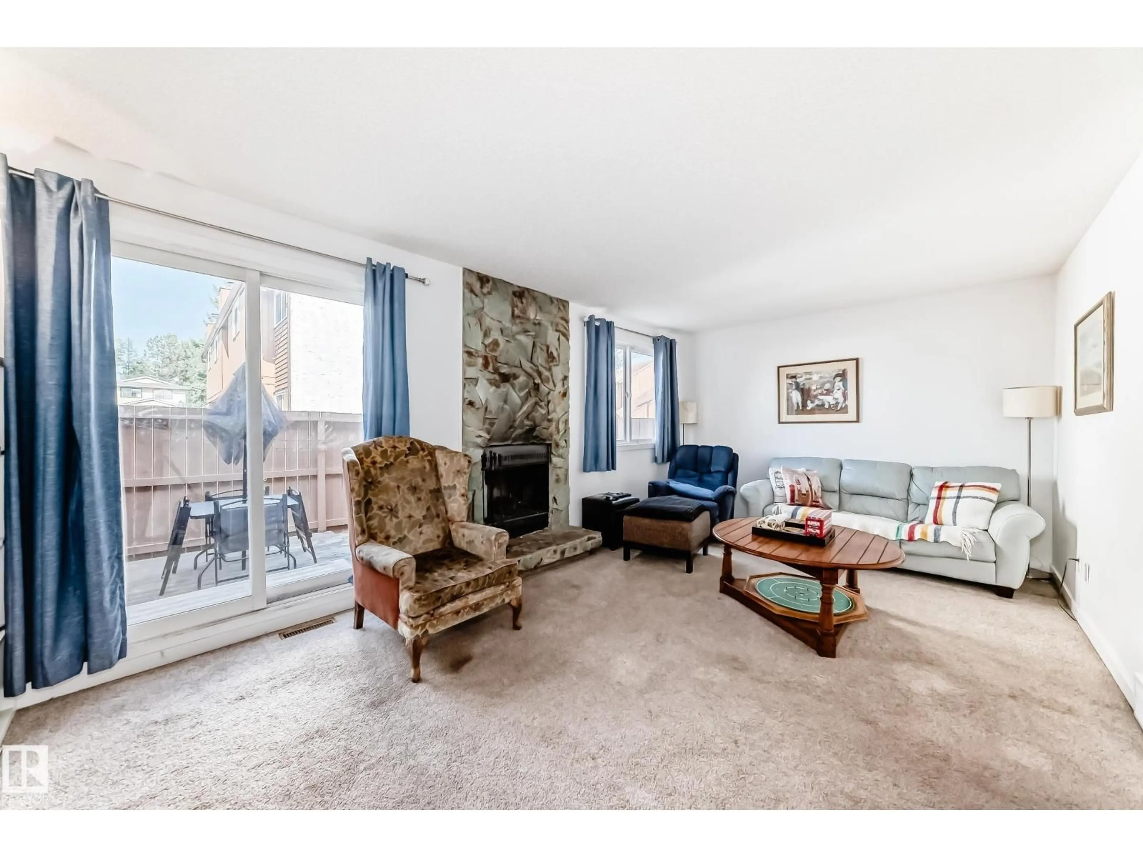 Living room with furniture, unknown for 18611 66 AV, Edmonton Alberta T5T2M3