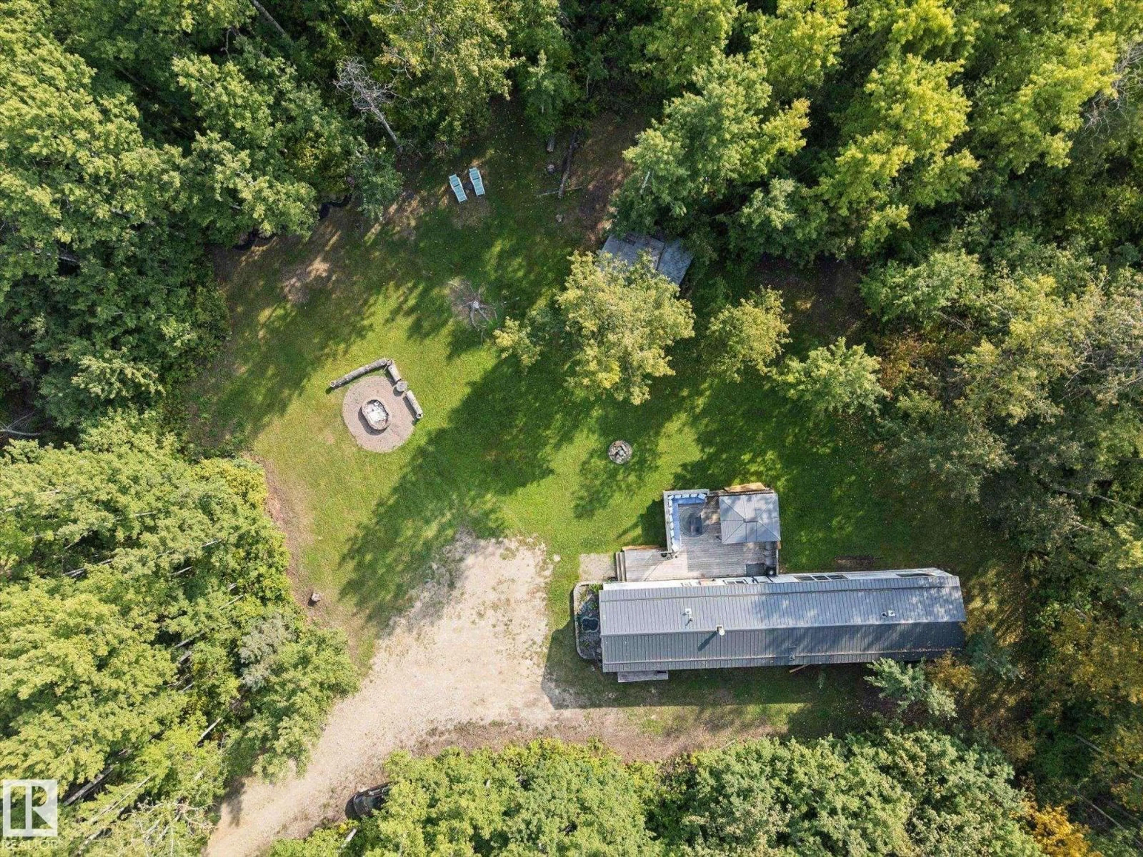 A pic from outside/outdoor area/front of a property/back of a property/a pic from drone, forest/trees view for 53319 - 327 RGE ROAD 31, Rural Parkland County Alberta T7Y0E3