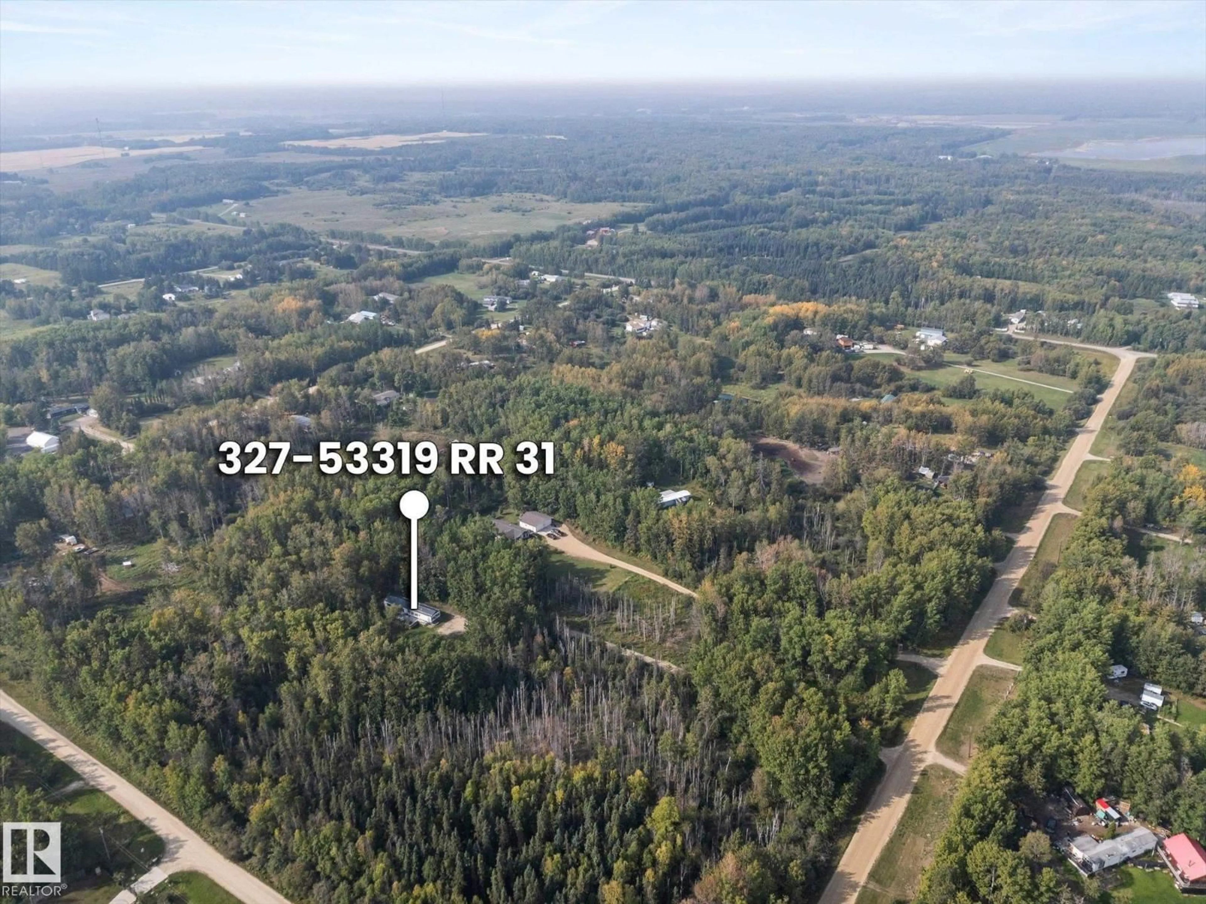 A pic from outside/outdoor area/front of a property/back of a property/a pic from drone, forest/trees view for 53319 - 327 RGE ROAD 31, Rural Parkland County Alberta T7Y0E3