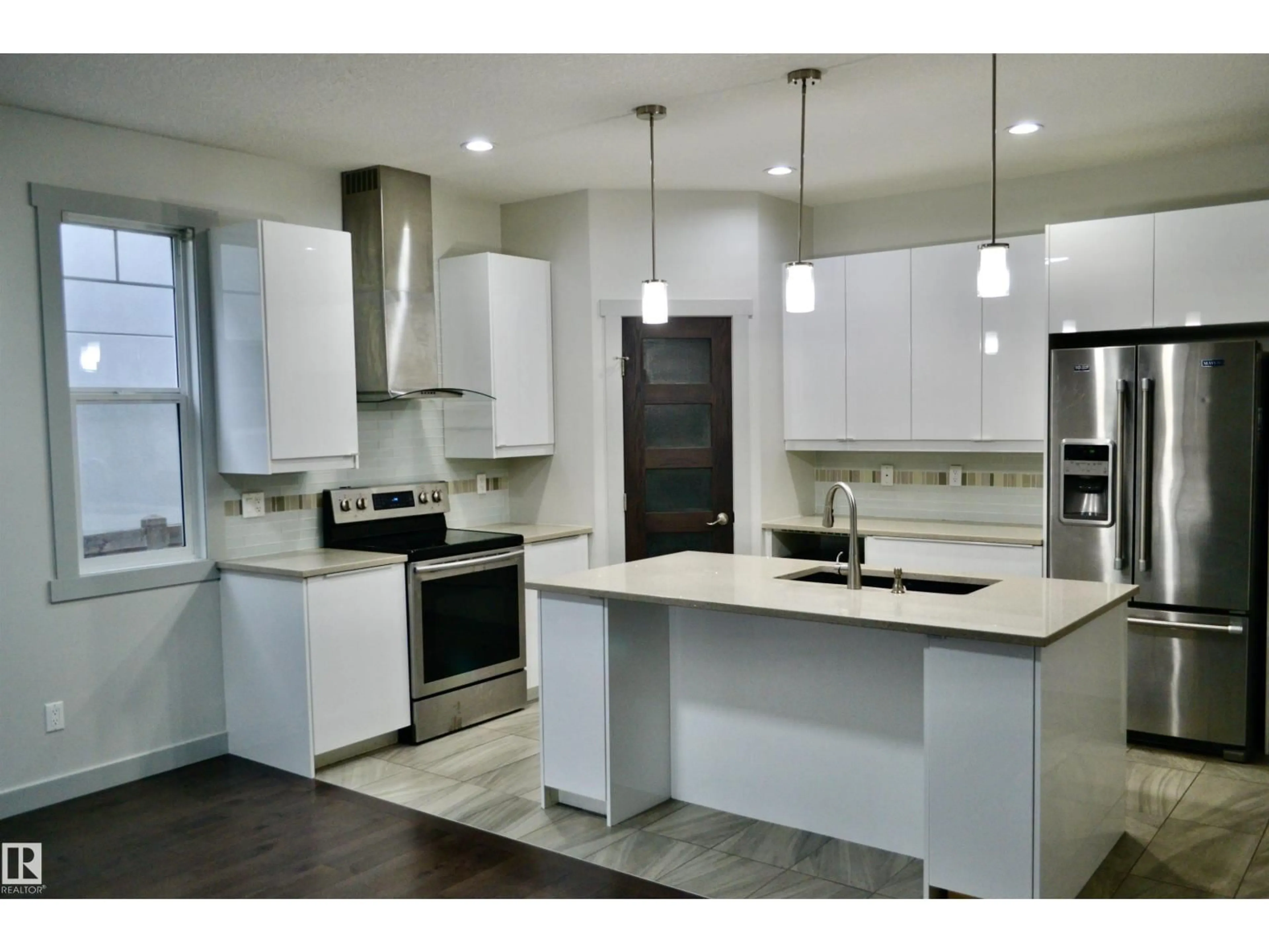 Open concept kitchen, unknown for 8950 81 AV, Edmonton Alberta T6C0W8
