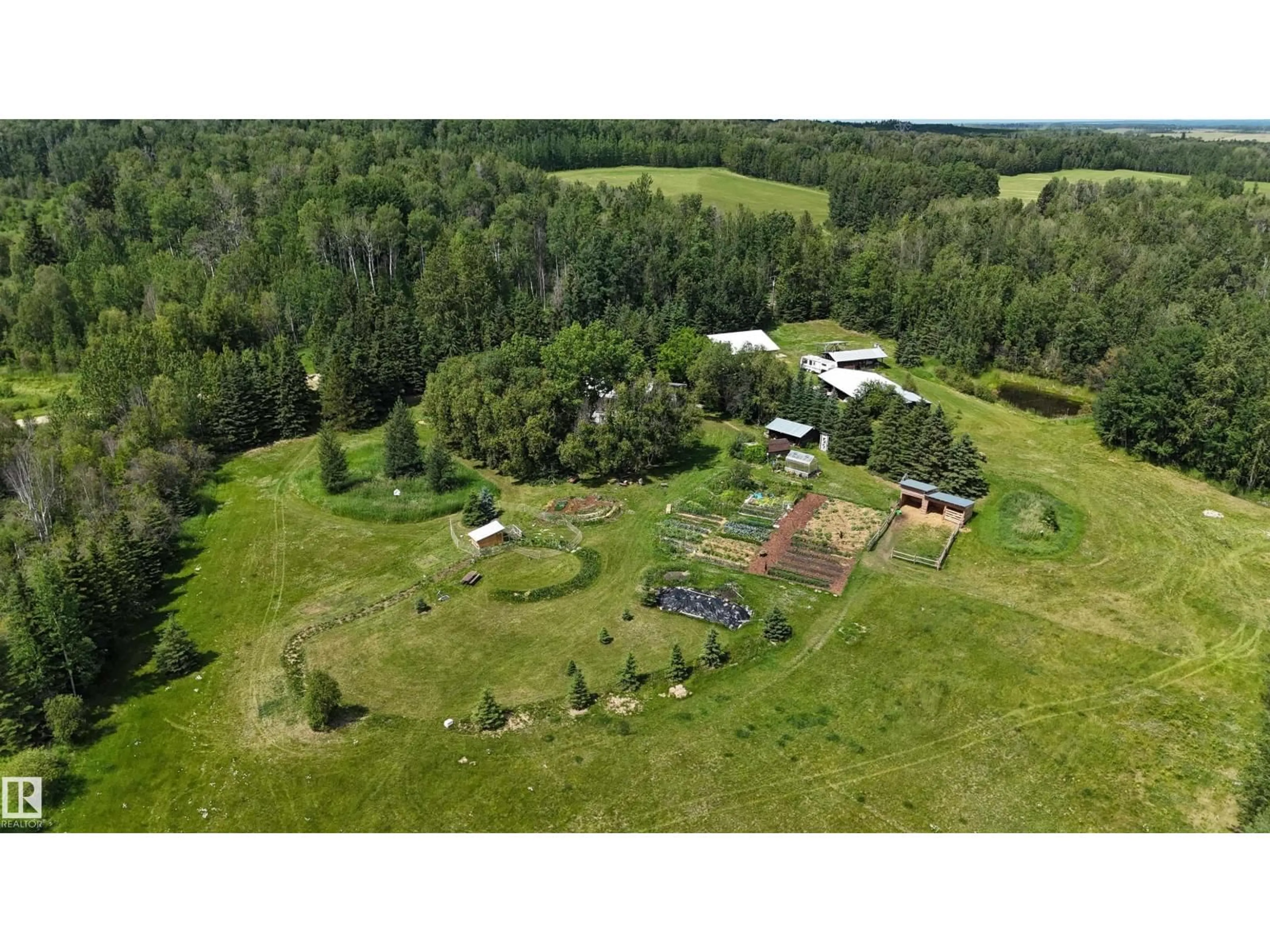 A pic from outside/outdoor area/front of a property/back of a property/a pic from drone, forest/trees view for 462075 RGE ROAD 33, Rural Wetaskiwin County Alberta T0C2X0