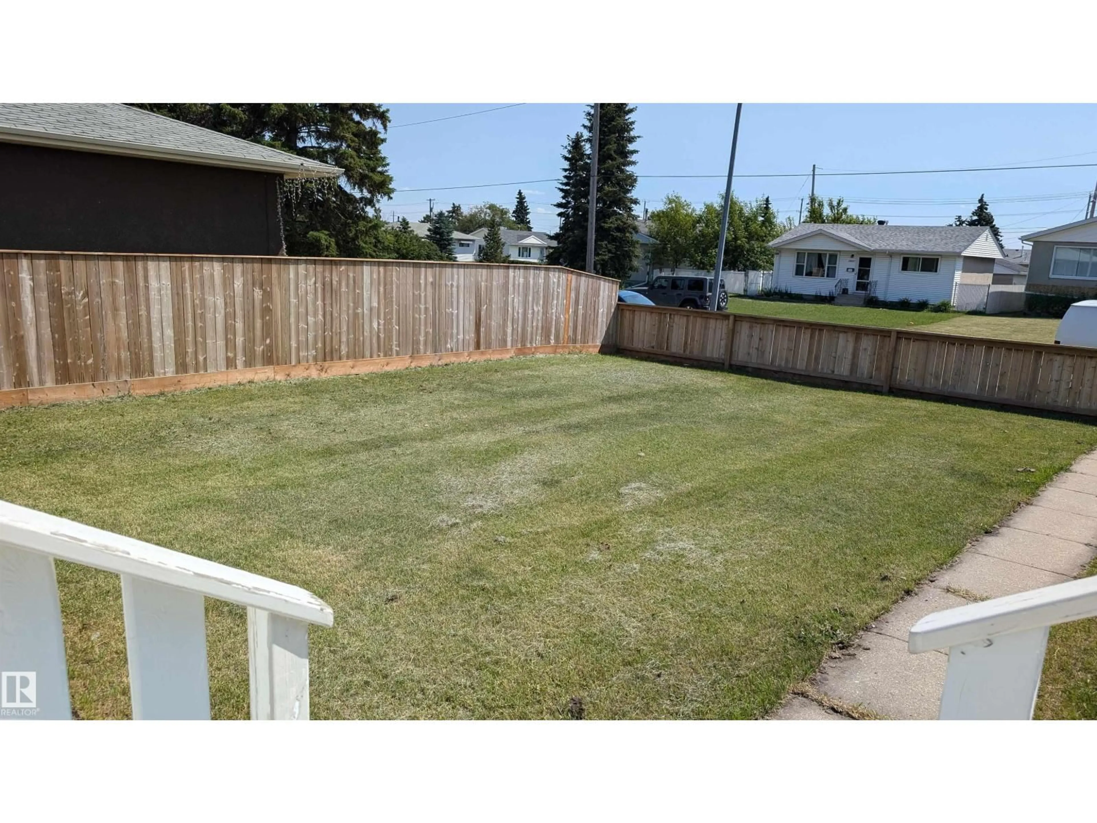 A pic from outside/outdoor area/front of a property/back of a property/a pic from drone, street for 7812 128 AV, Edmonton Alberta T5C1T7