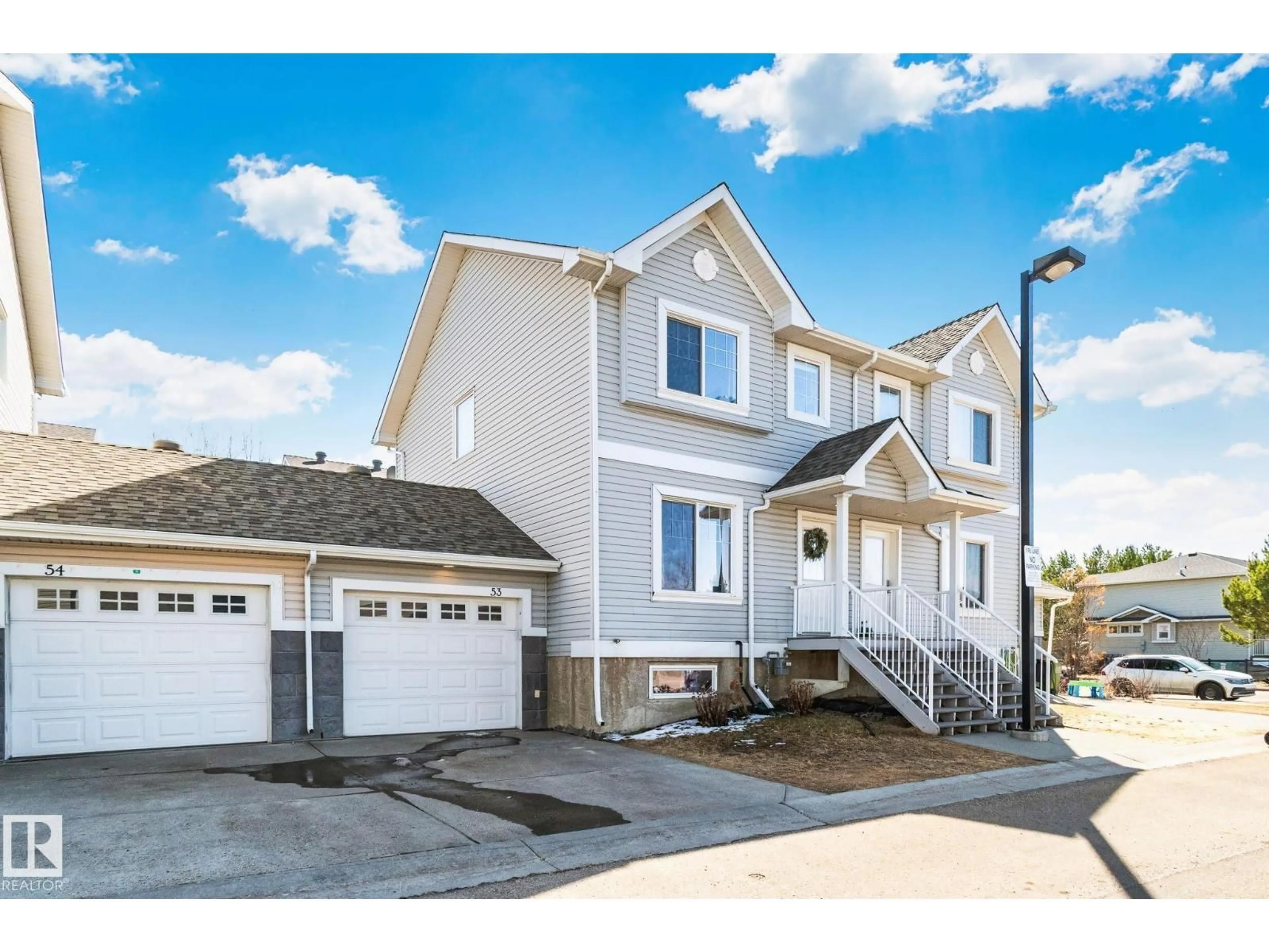 Home with vinyl exterior material, street for 2503 - 53 24 ST, Edmonton Alberta T6T0B5