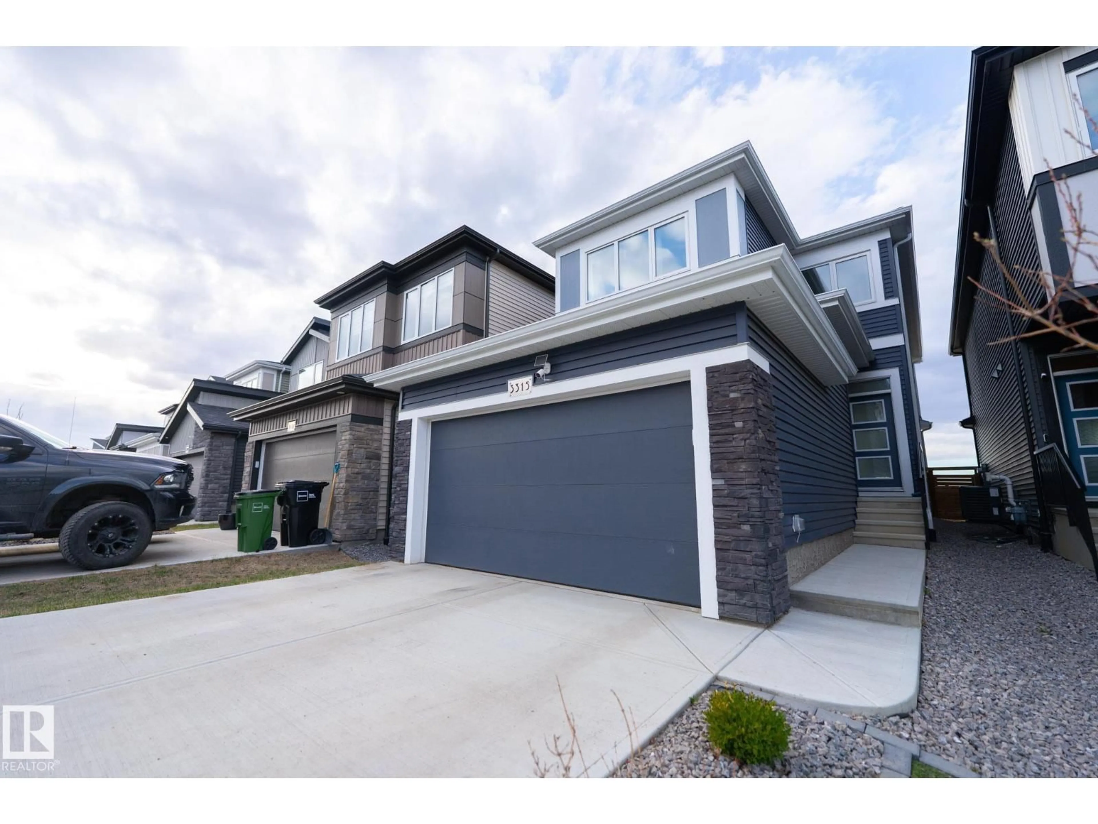 Home with vinyl exterior material, street for 3315 KULAY WY, Edmonton Alberta T6W5E7