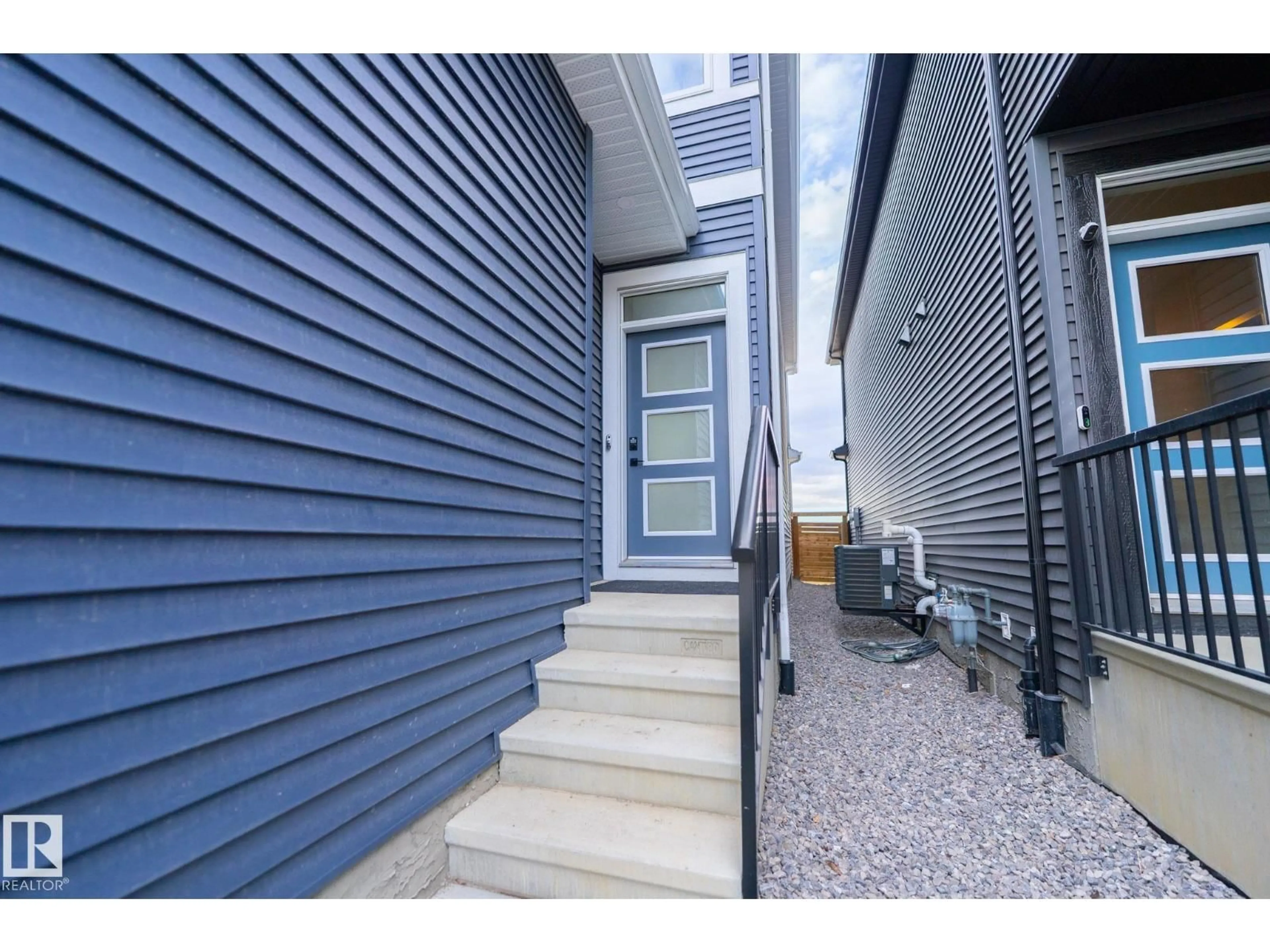 Home with vinyl exterior material, street for 3315 KULAY WY, Edmonton Alberta T6W5E7