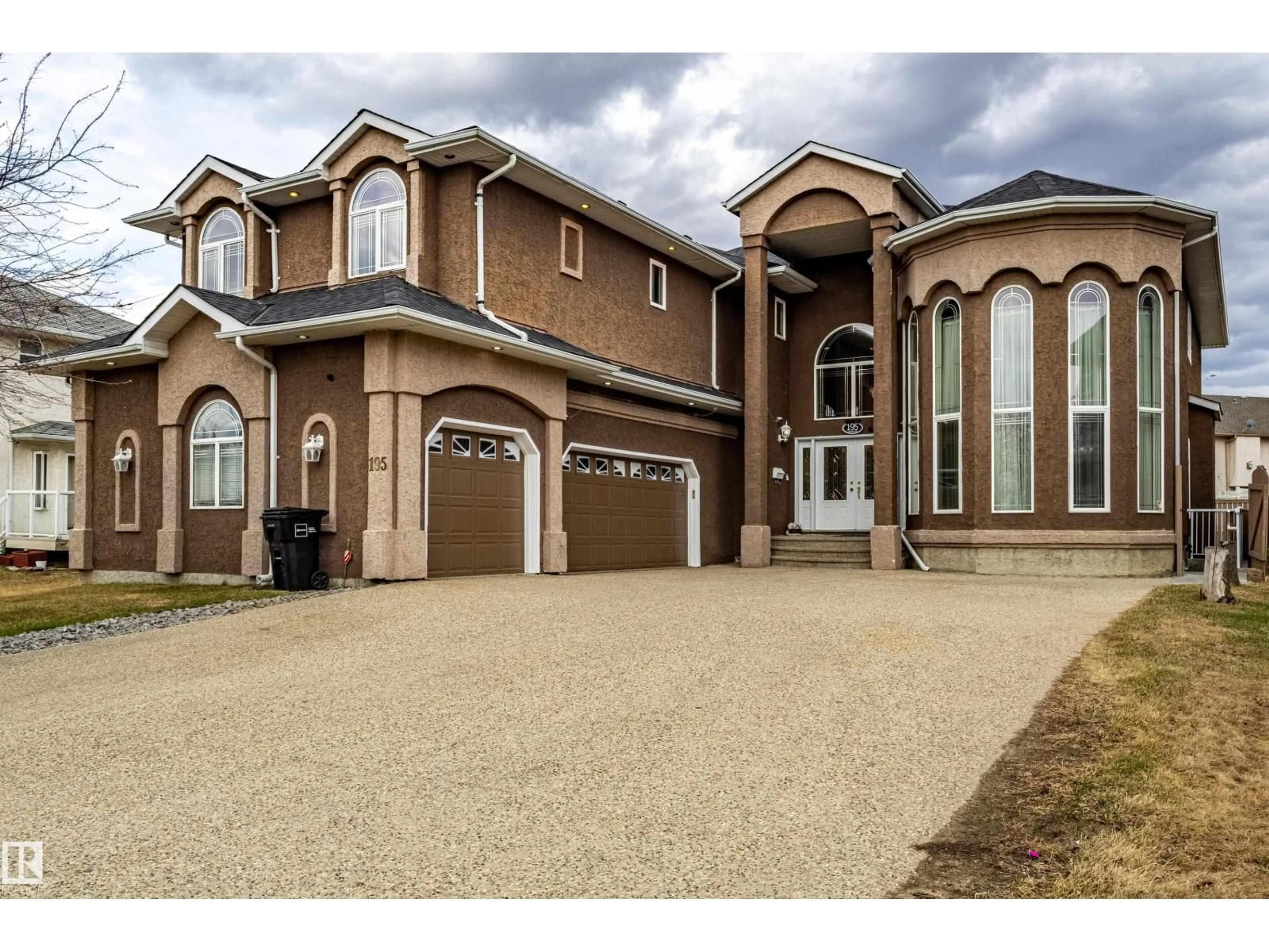 Home with brick exterior material, street for 195 KULAWY DR, Edmonton Alberta T6C7E4