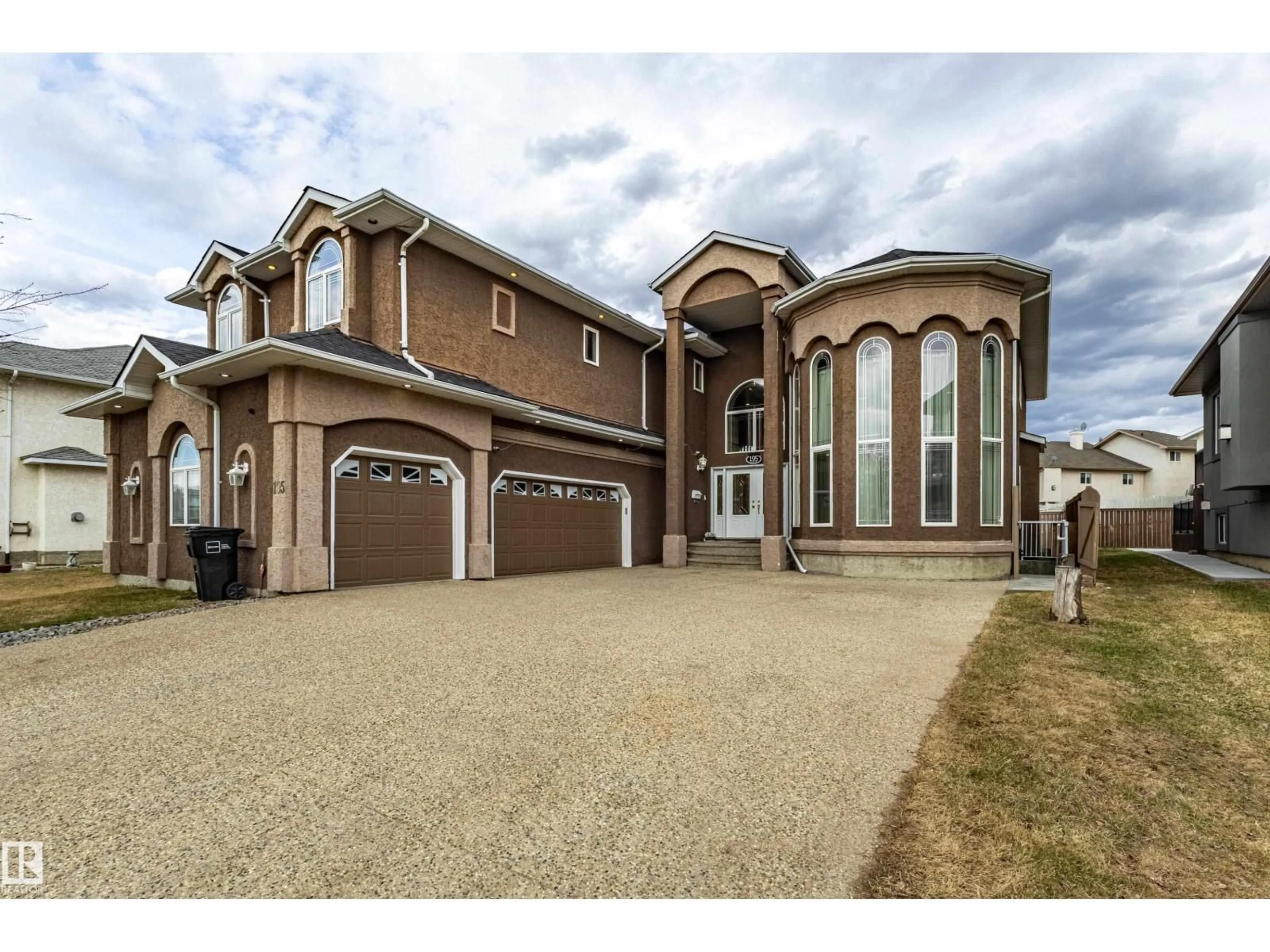 Home with brick exterior material, street for 195 KULAWY DR, Edmonton Alberta T6C7E4