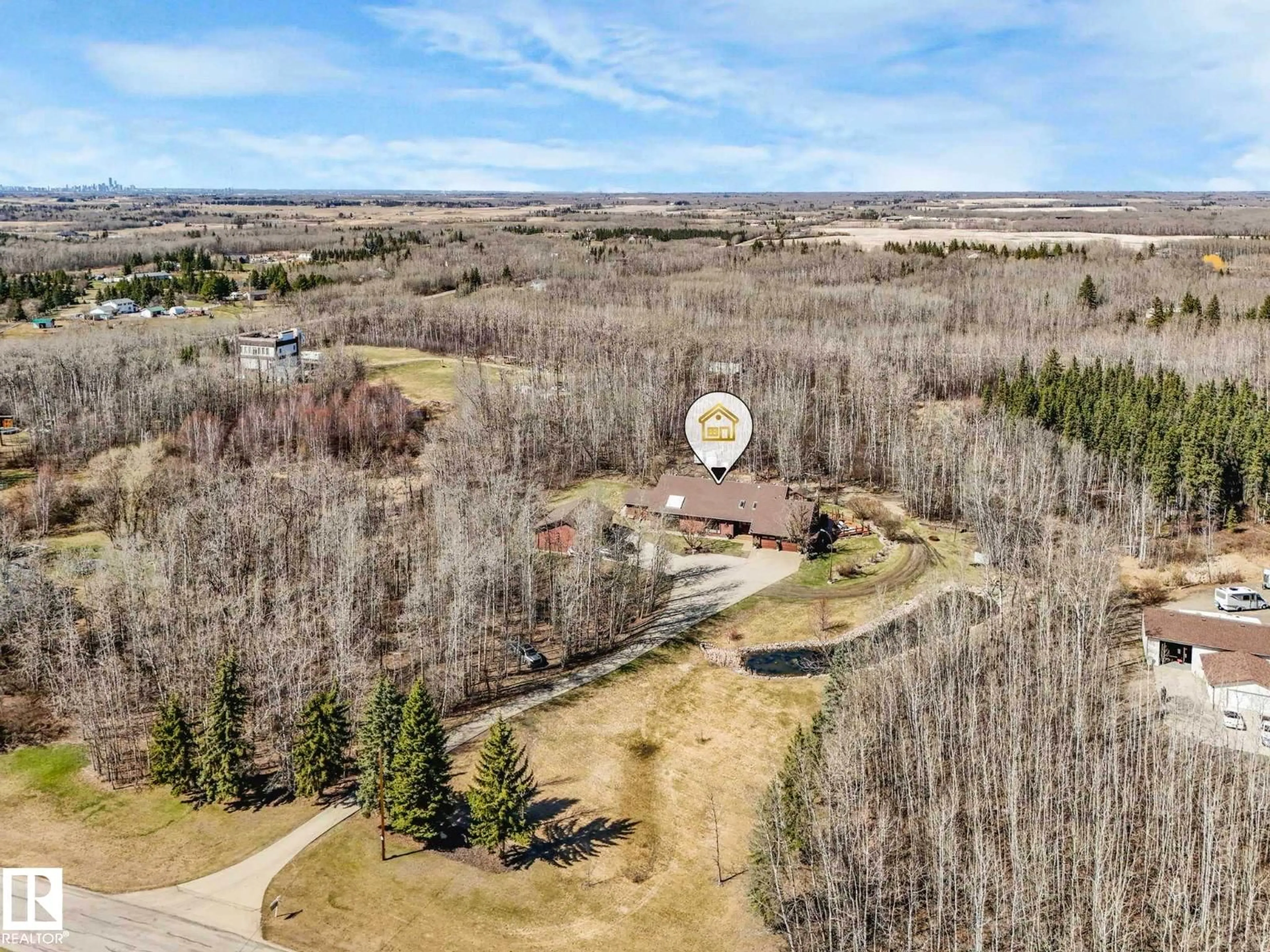 A pic from outside/outdoor area/front of a property/back of a property/a pic from drone, unknown for 51313 - 182 RGE ROAD 231, Rural Strathcona County Alberta T8B1K7