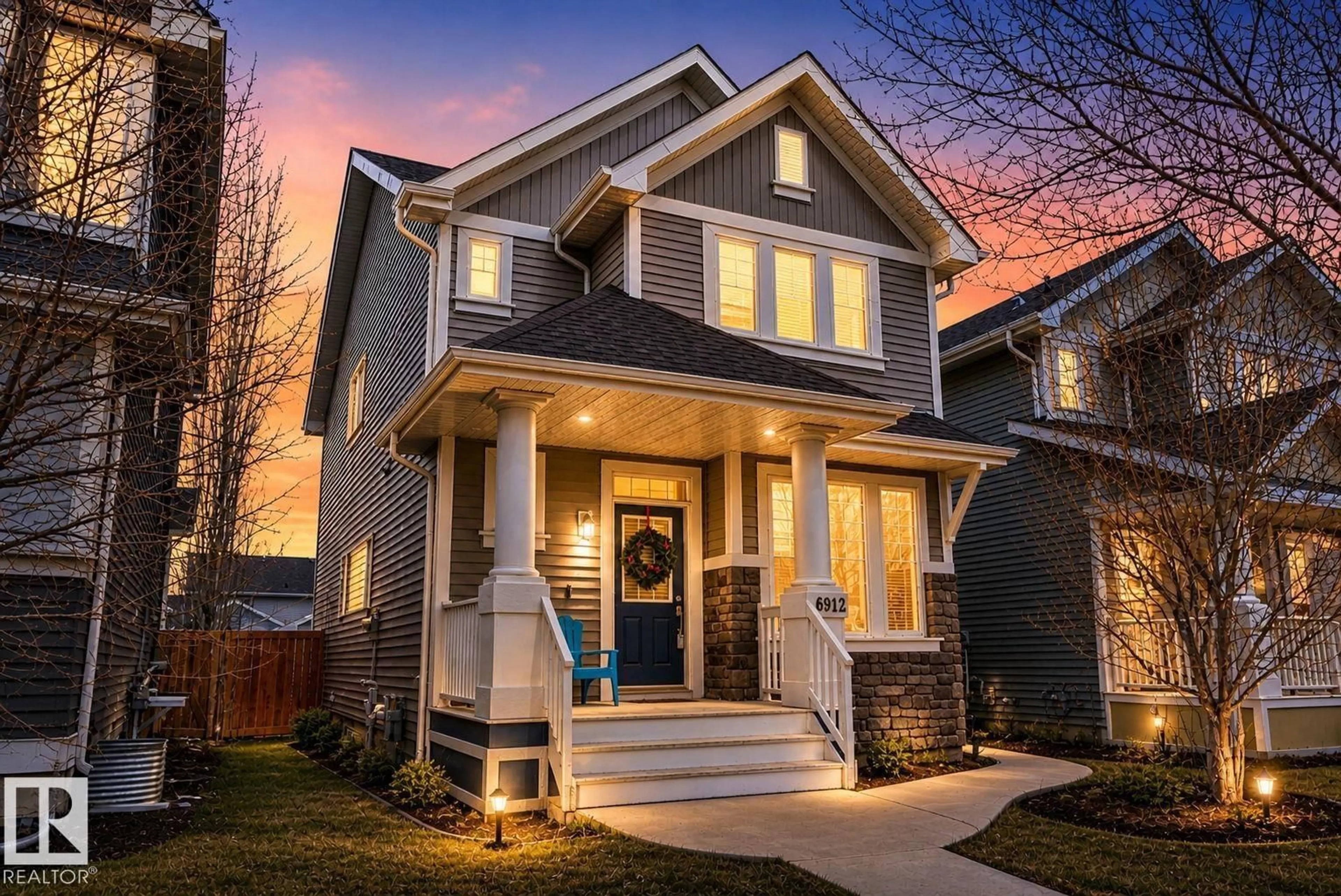 Home with brick exterior material, street for 6912 22 AV, Edmonton Alberta T6X0V4
