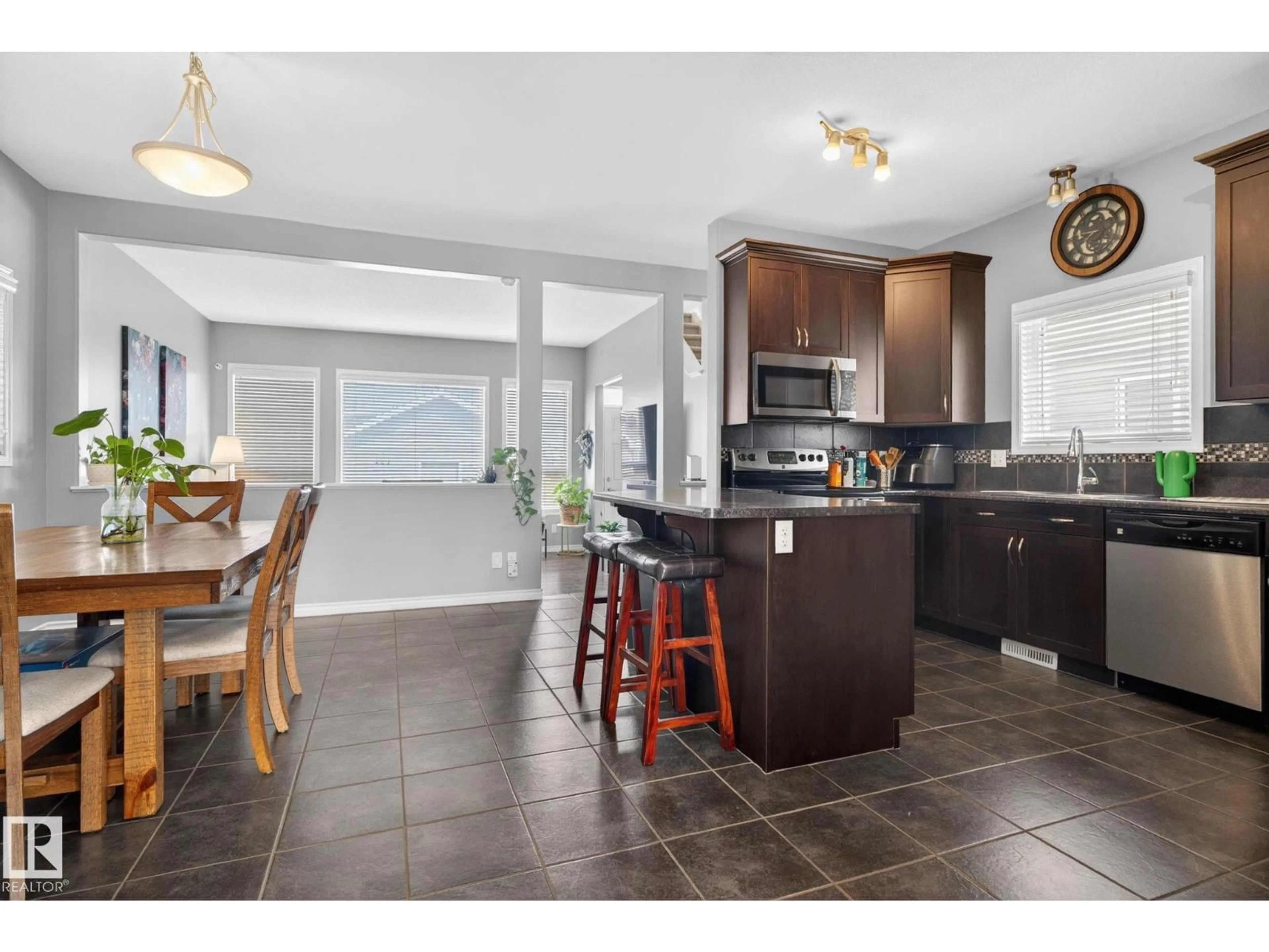 Open concept kitchen, ceramic/tile floor for 6912 22 AV, Edmonton Alberta T6X0V4