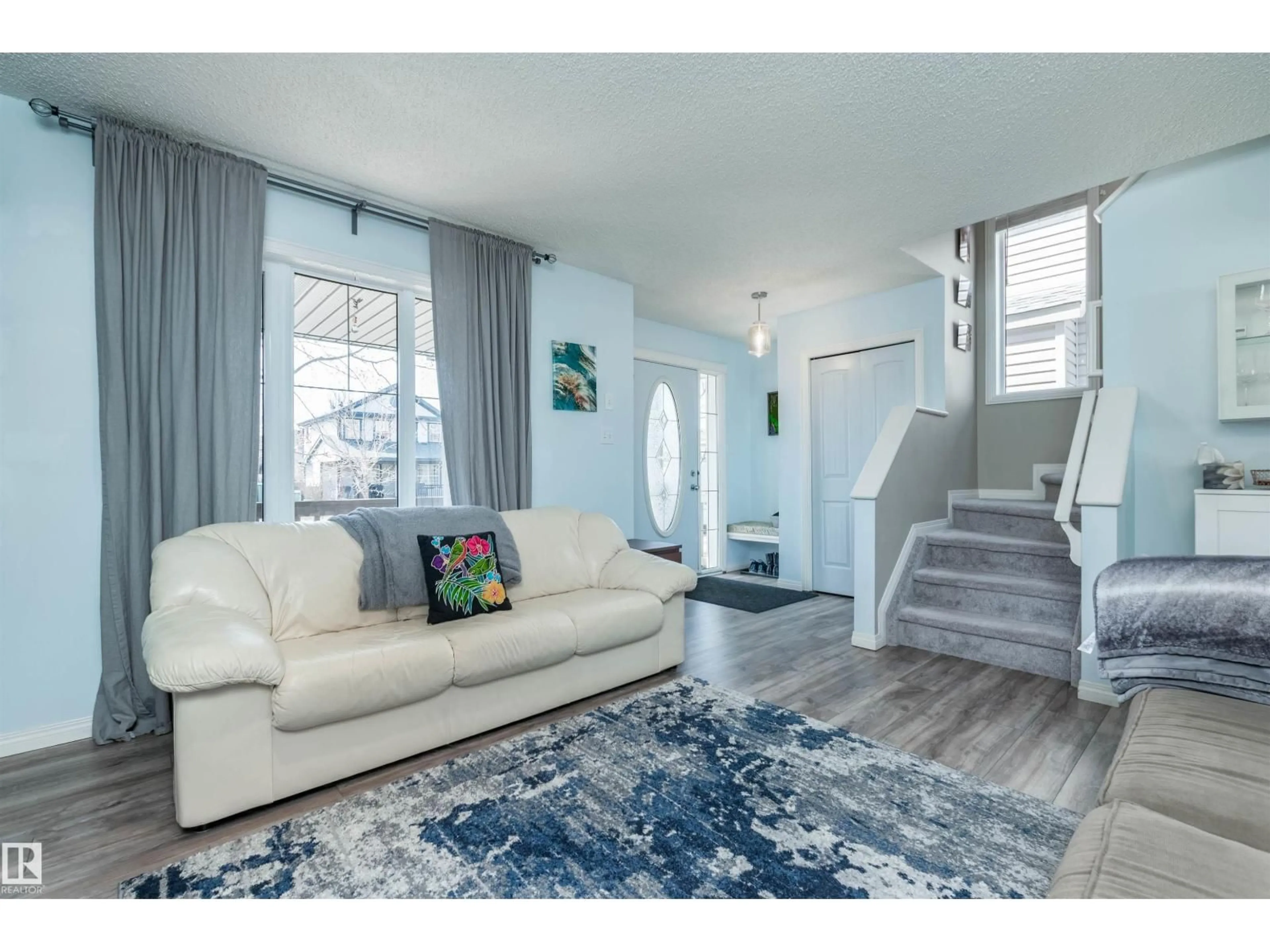 Living room with furniture, unknown for SW - 12204 18 AV, Edmonton Alberta T6W1S3