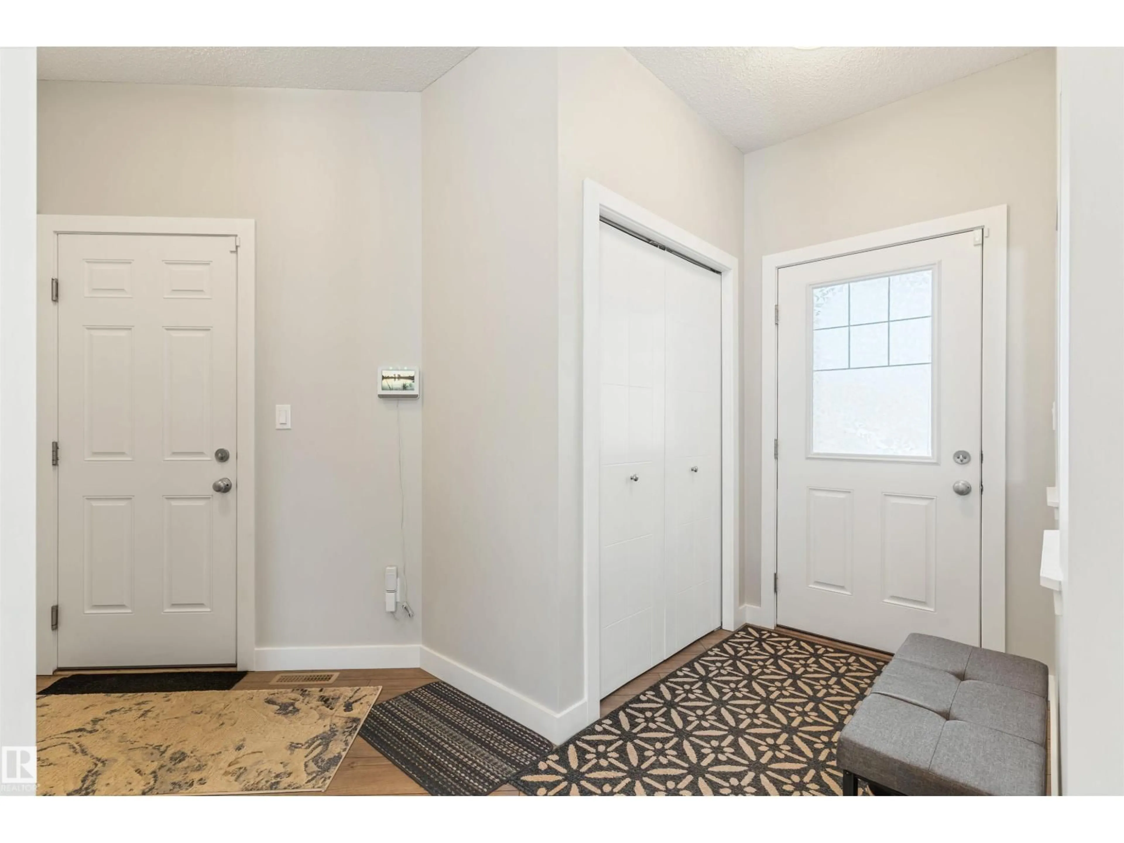 Indoor entryway for 8011 EVANS CR, Edmonton Alberta T6M0T7
