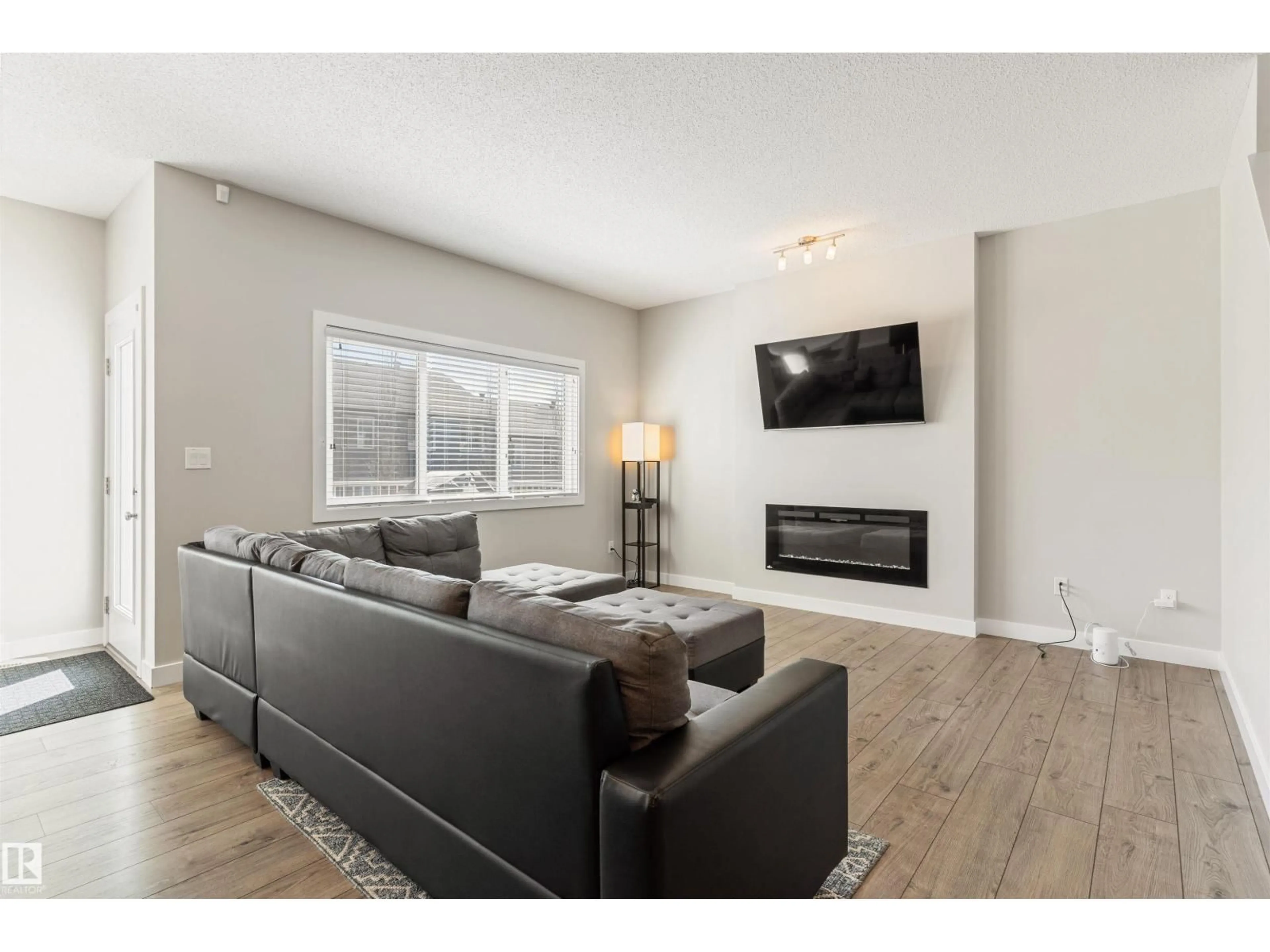 Living room with furniture, unknown for 8011 EVANS CR, Edmonton Alberta T6M0T7