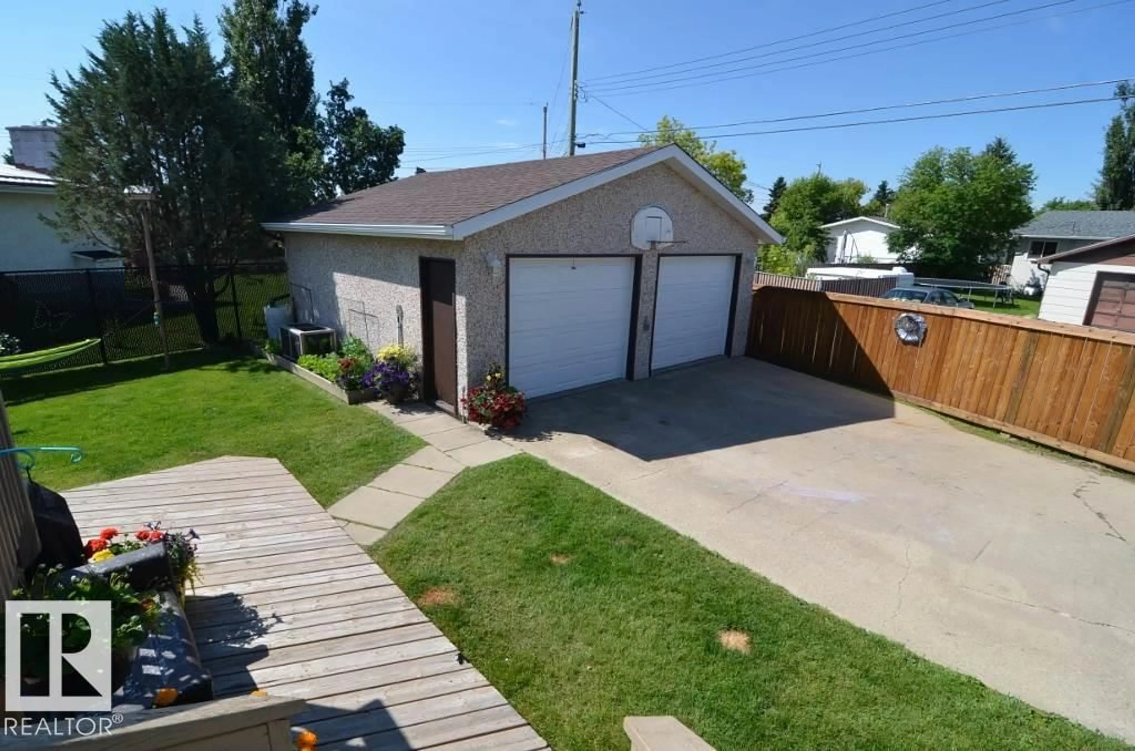 A pic from outside/outdoor area/front of a property/back of a property/a pic from drone, street for 4904 43A ST, Barrhead Alberta T7N1J5