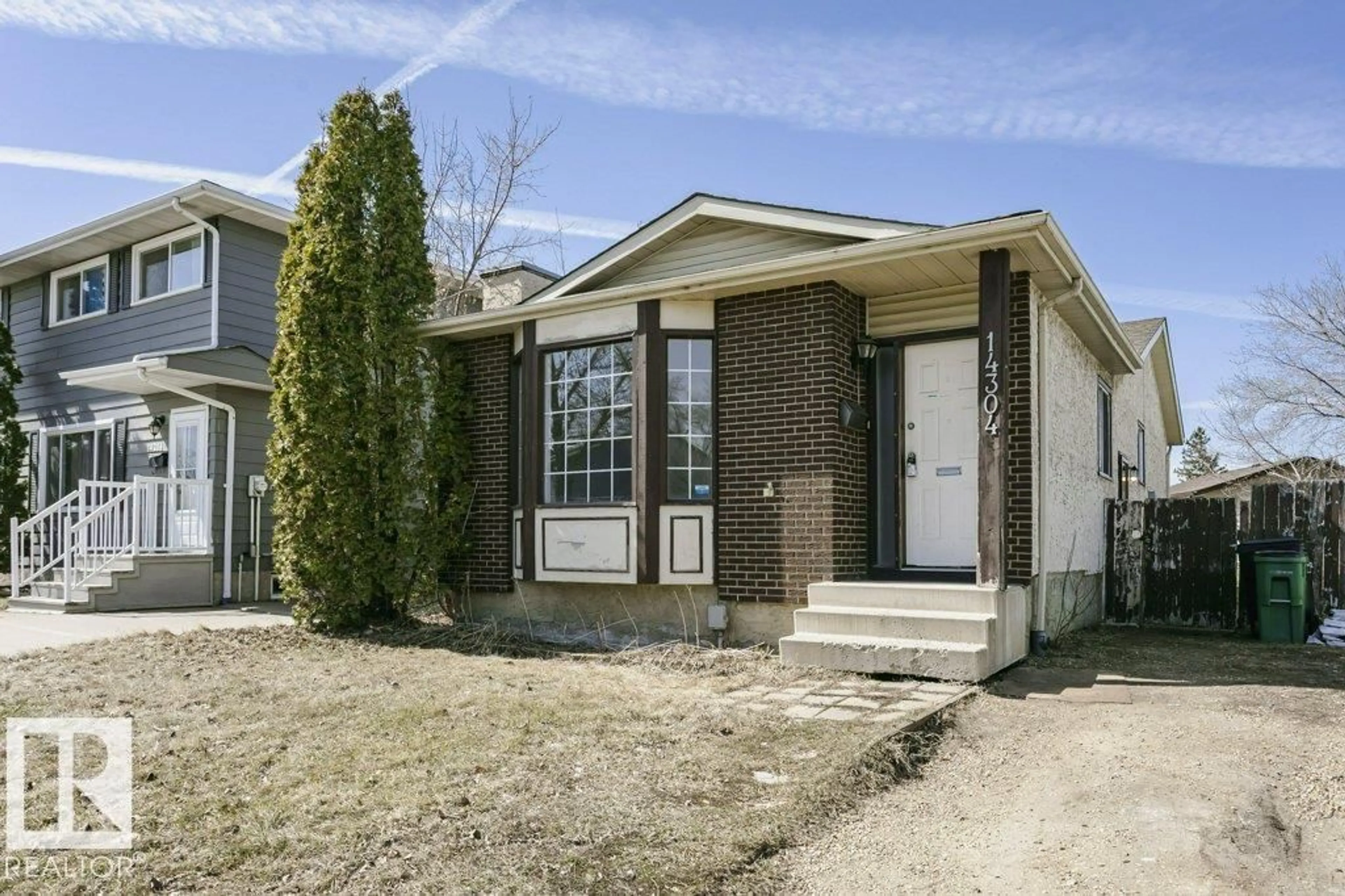 Home with brick exterior material, street for 14304 32 ST, Edmonton Alberta T5Y1P1