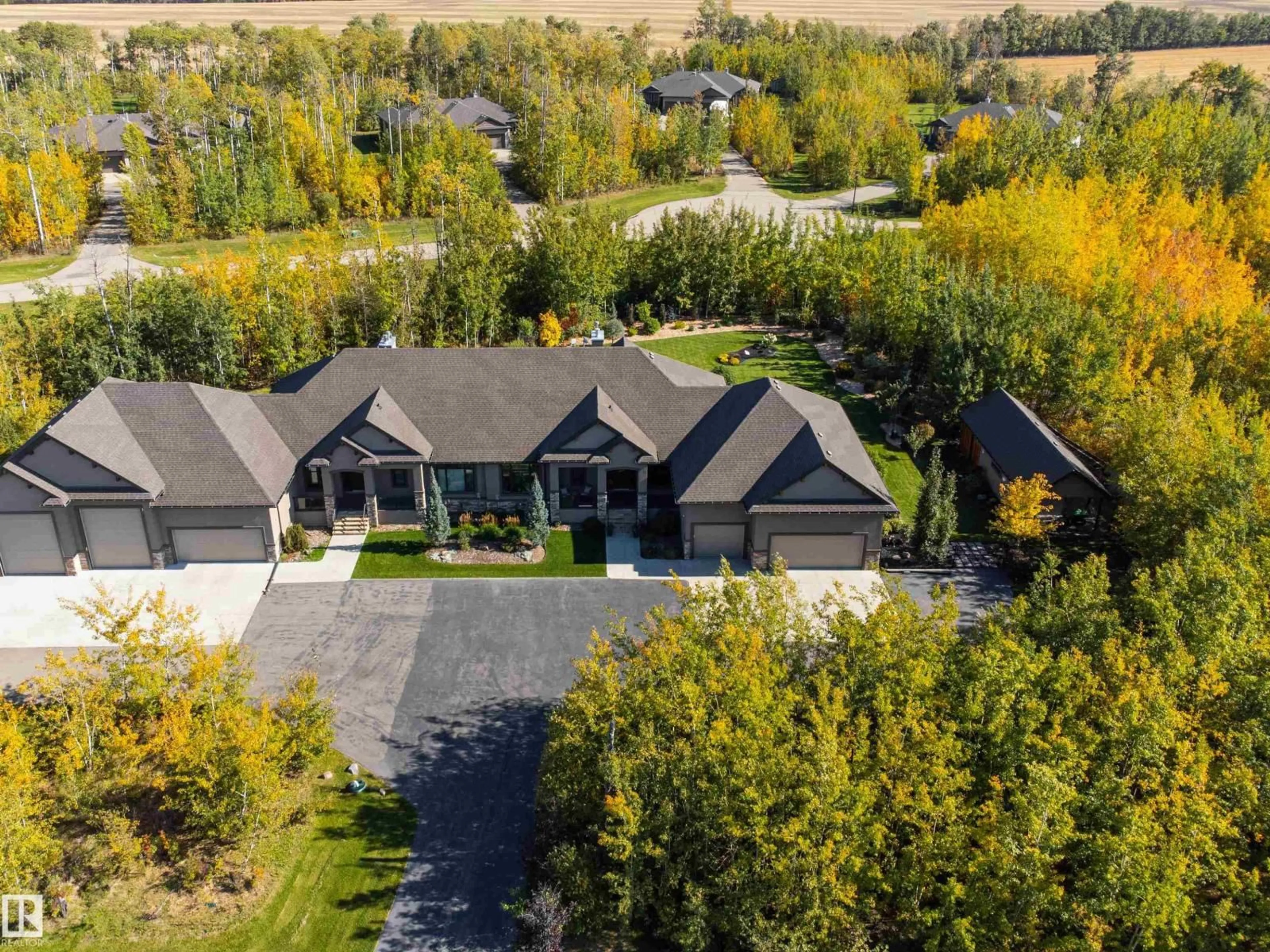 A pic from outside/outdoor area/front of a property/back of a property/a pic from drone, unknown for 21A - 21A RGE RD 272 RGE RD, Rural Parkland County Alberta T7X3M5