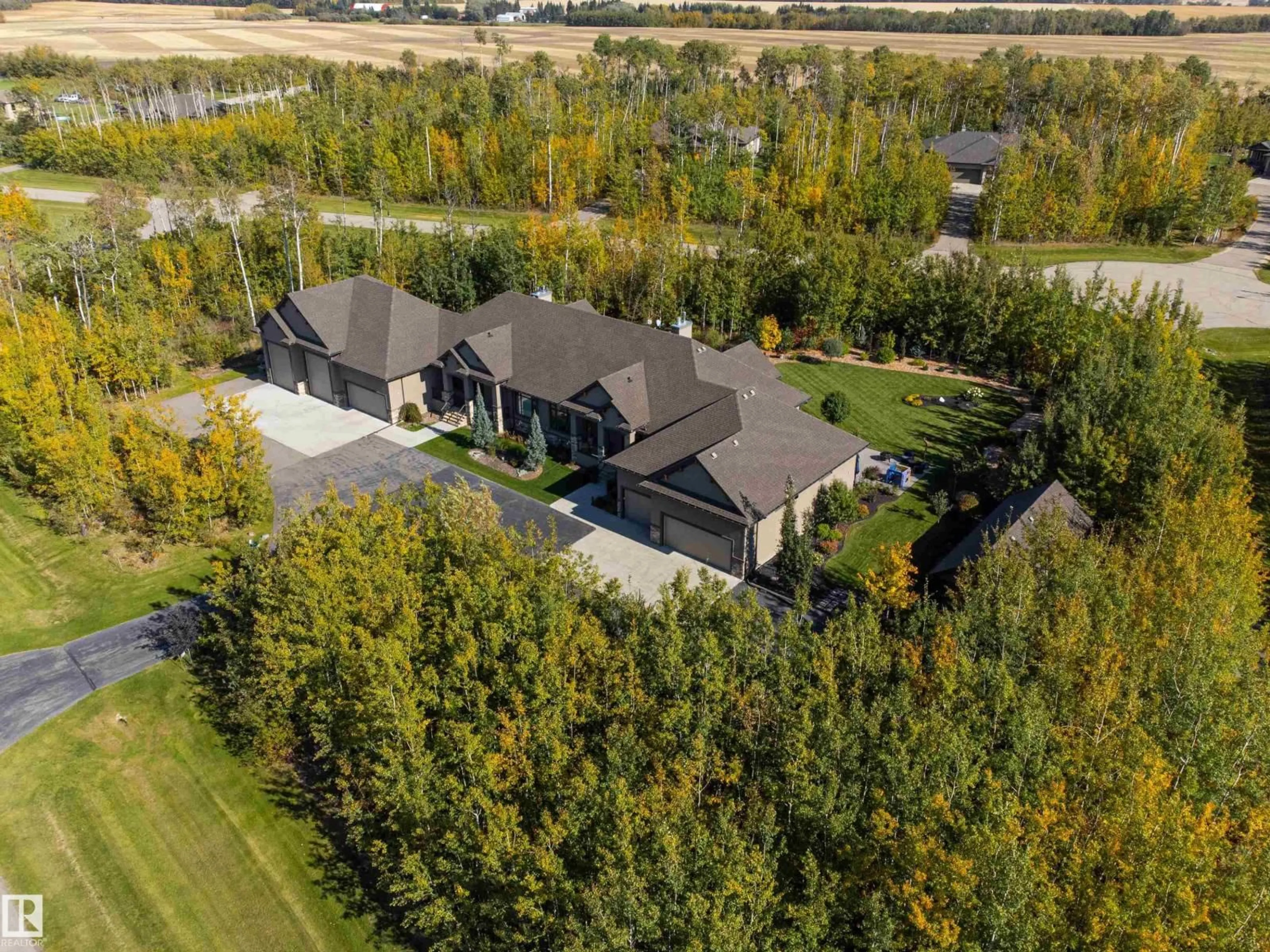 A pic from outside/outdoor area/front of a property/back of a property/a pic from drone, unknown for 21A - 21A RGE RD 272 RGE RD, Rural Parkland County Alberta T7X3M5