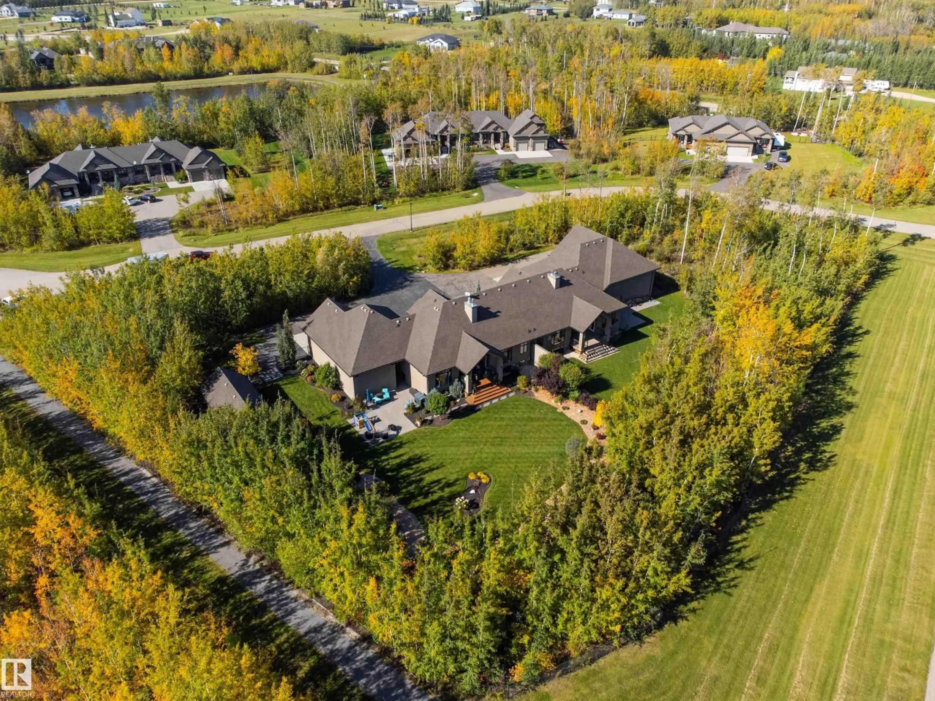 A pic from outside/outdoor area/front of a property/back of a property/a pic from drone, unknown for 21A - 21A RGE RD 272 RGE RD, Rural Parkland County Alberta T7X3M5