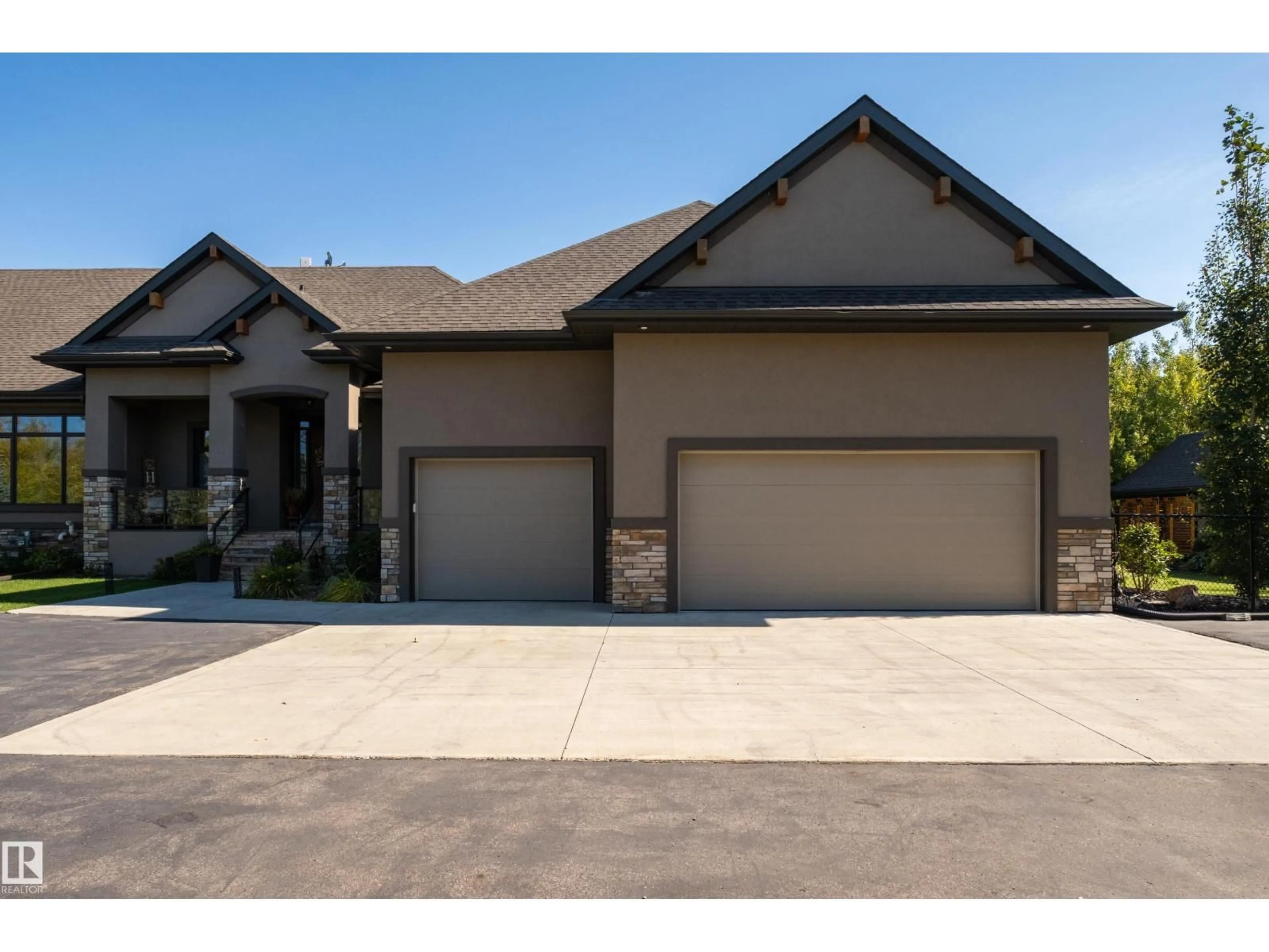 Home with brick exterior material, street for 21A - 21A RGE RD 272 RGE RD, Rural Parkland County Alberta T7X3M5