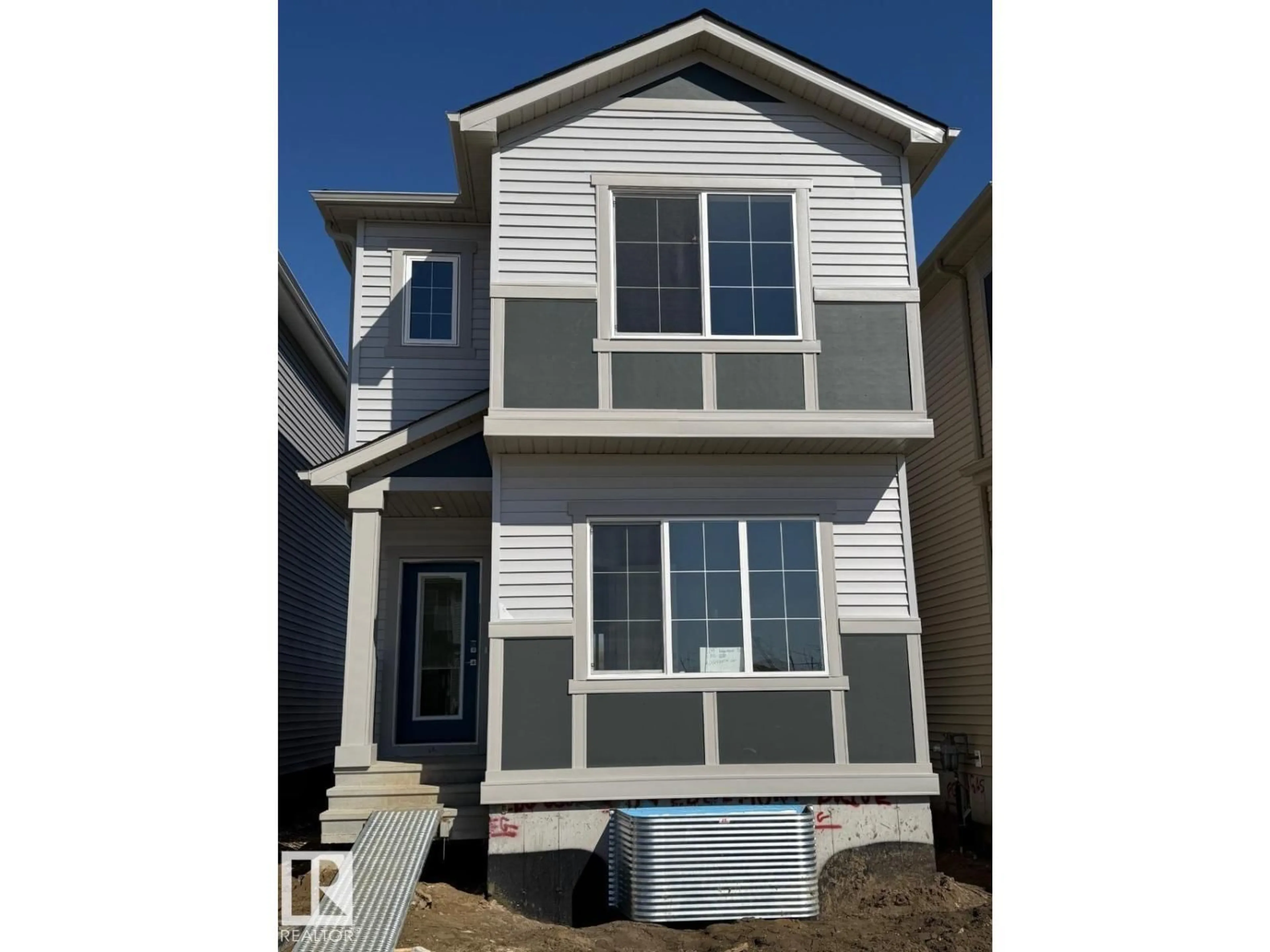 Home with vinyl exterior material, street for 309 EDGEMONT DR, Edmonton Alberta T6M3G7