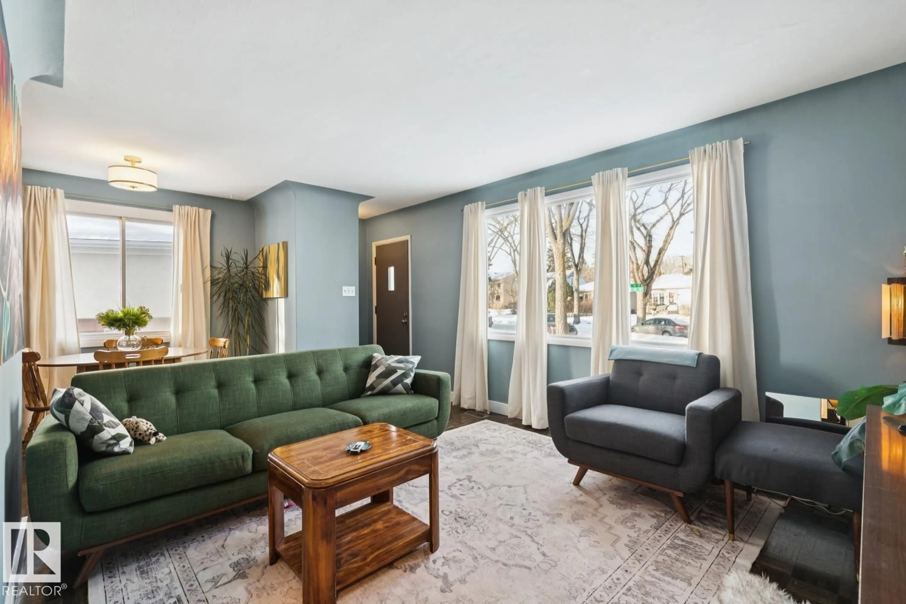 Living room with furniture, unknown for 7601 91 AV, Edmonton Alberta T6C1P7