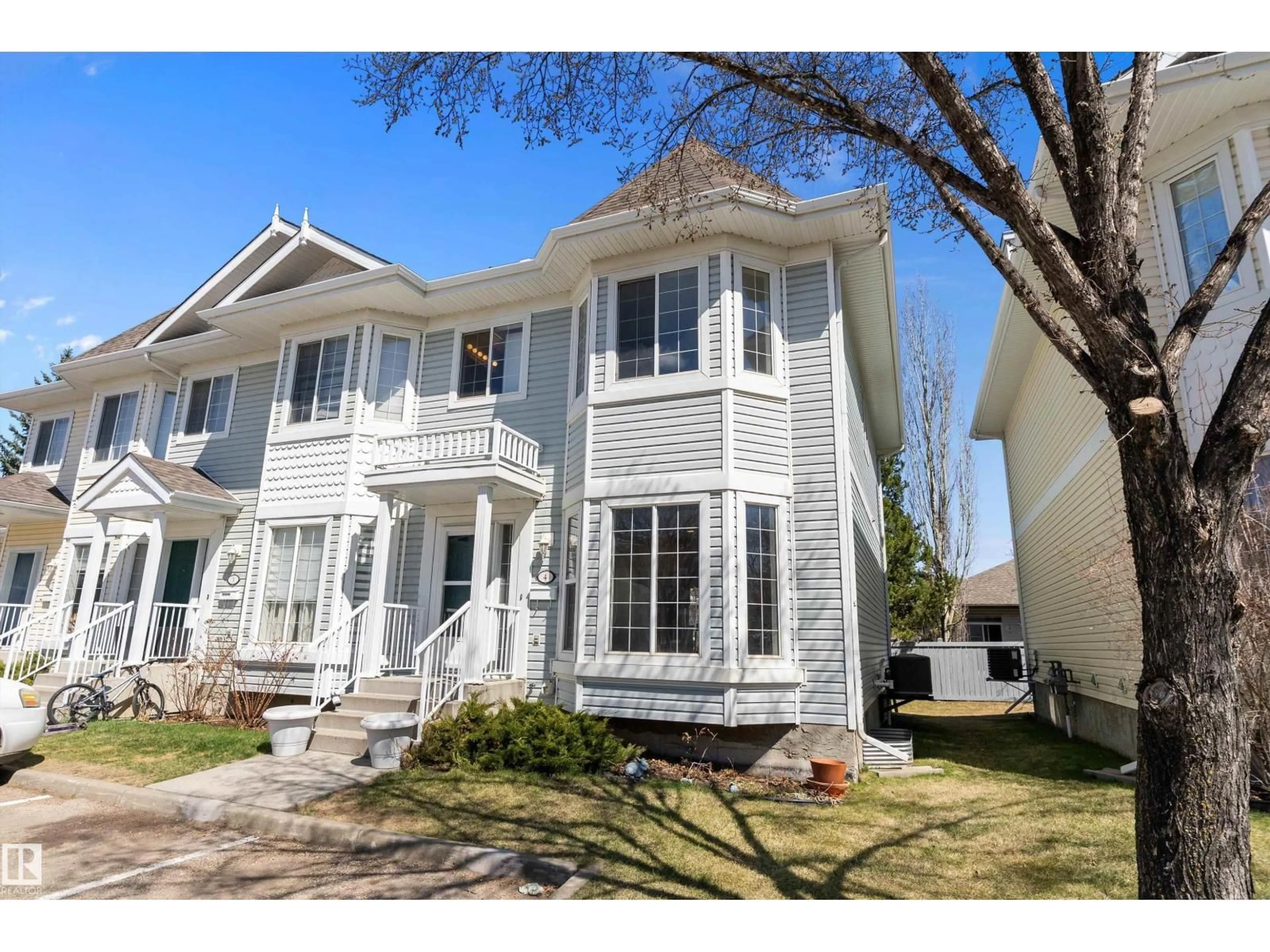 Home with vinyl exterior material, street for #4 - 1780 GLASTONBURY BV, Edmonton Alberta T5T6P9