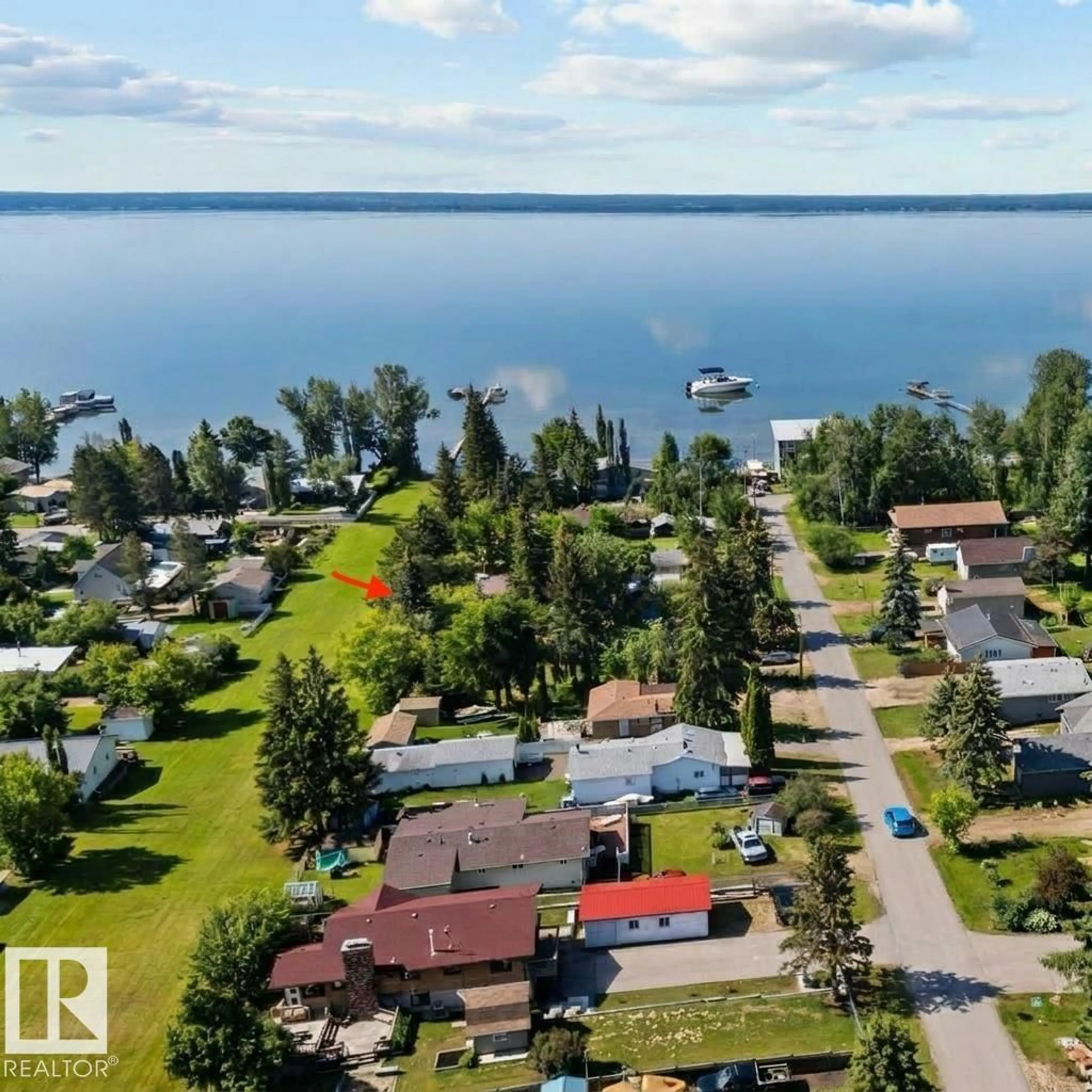 A pic from outside/outdoor area/front of a property/back of a property/a pic from drone, water/lake/river/ocean view for 408 4 STREET, Rural Lac Ste. Anne County Alberta T0E1A0