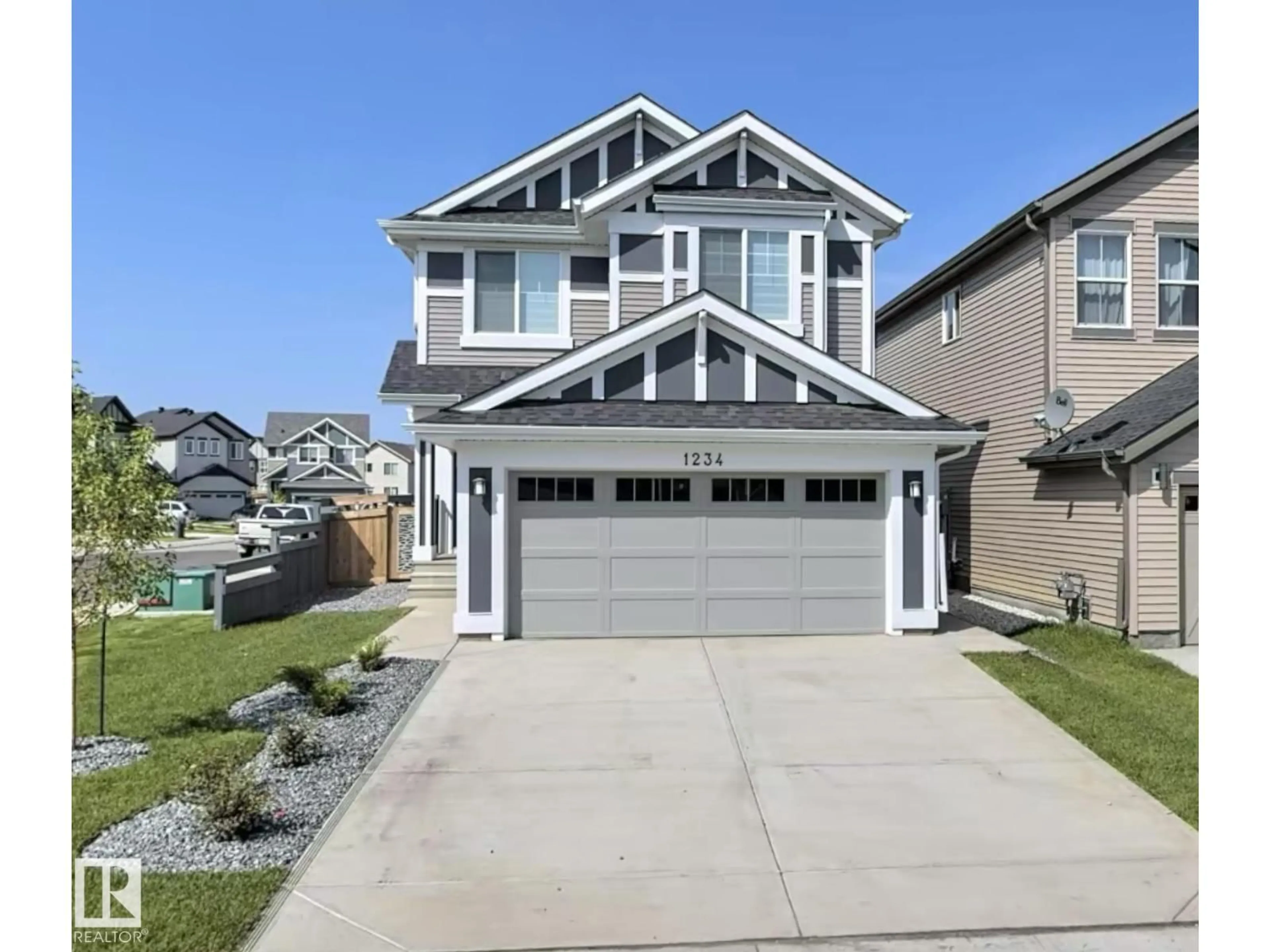 Home with vinyl exterior material, street for 1234 DANIELS CR, Edmonton Alberta T6W3V6
