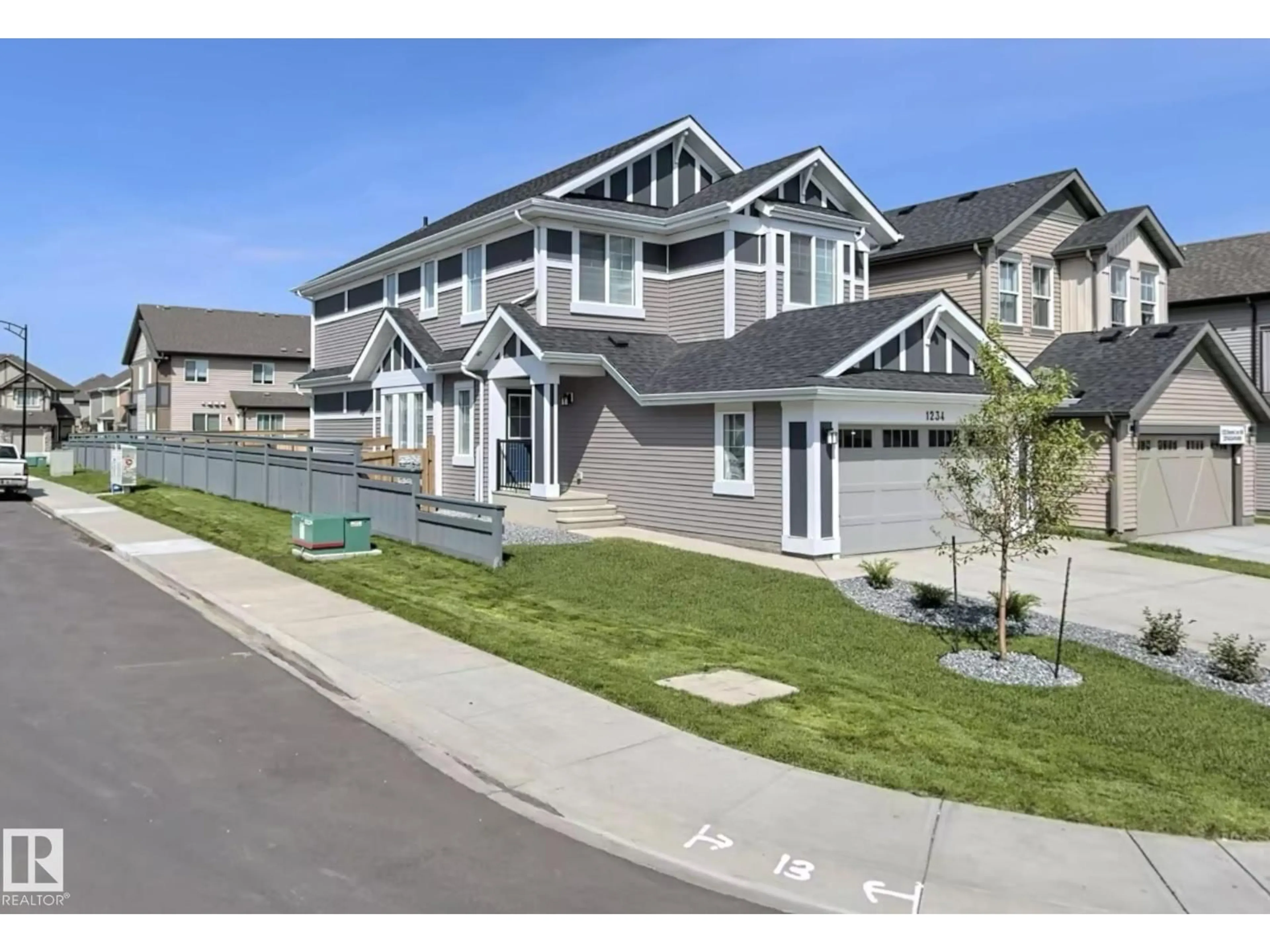 Home with vinyl exterior material, street for 1234 DANIELS CR, Edmonton Alberta T6W3V6