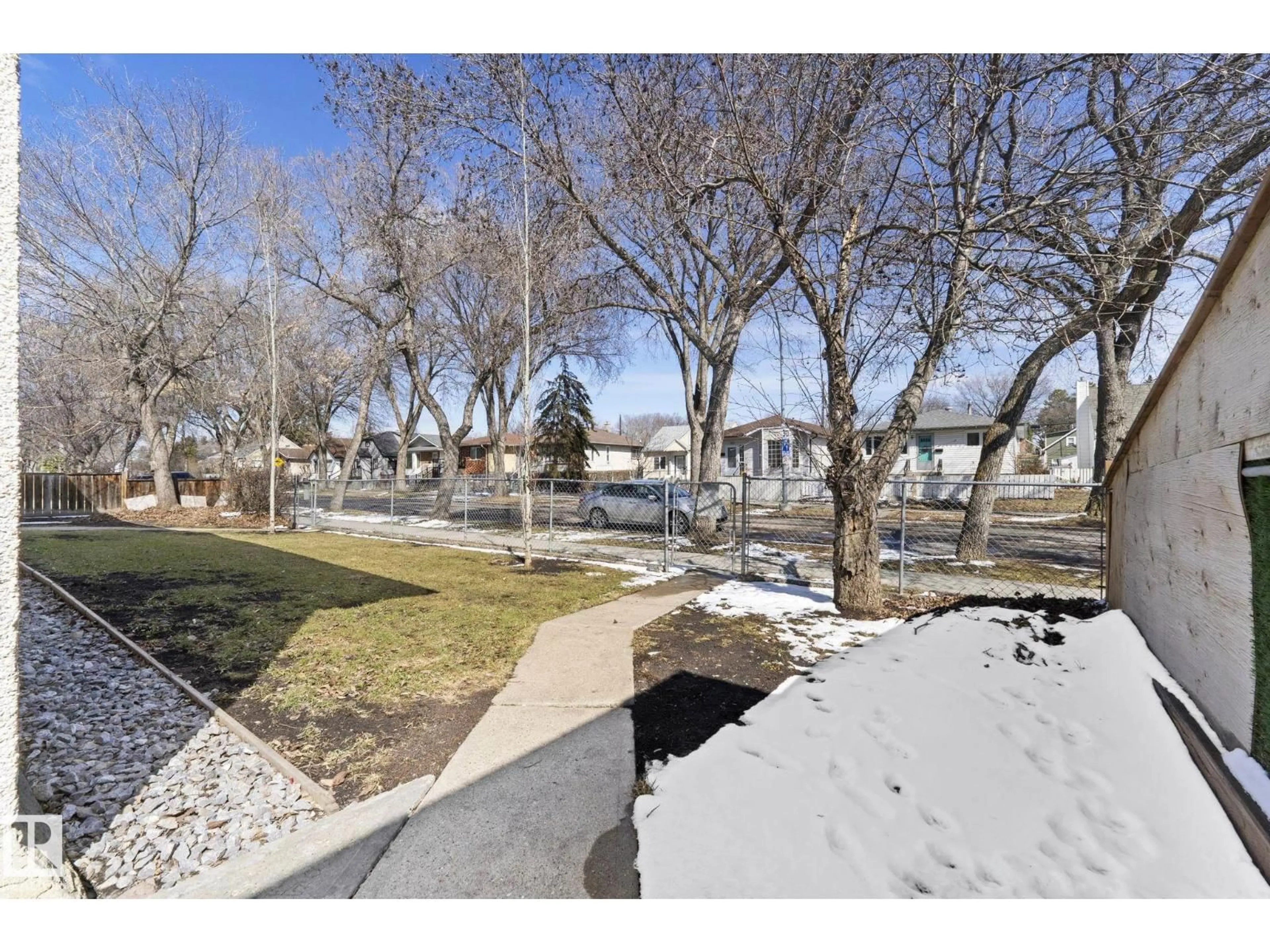 A pic from outside/outdoor area/front of a property/back of a property/a pic from drone, street for 12210 92 ST, Edmonton Alberta T5G1B3