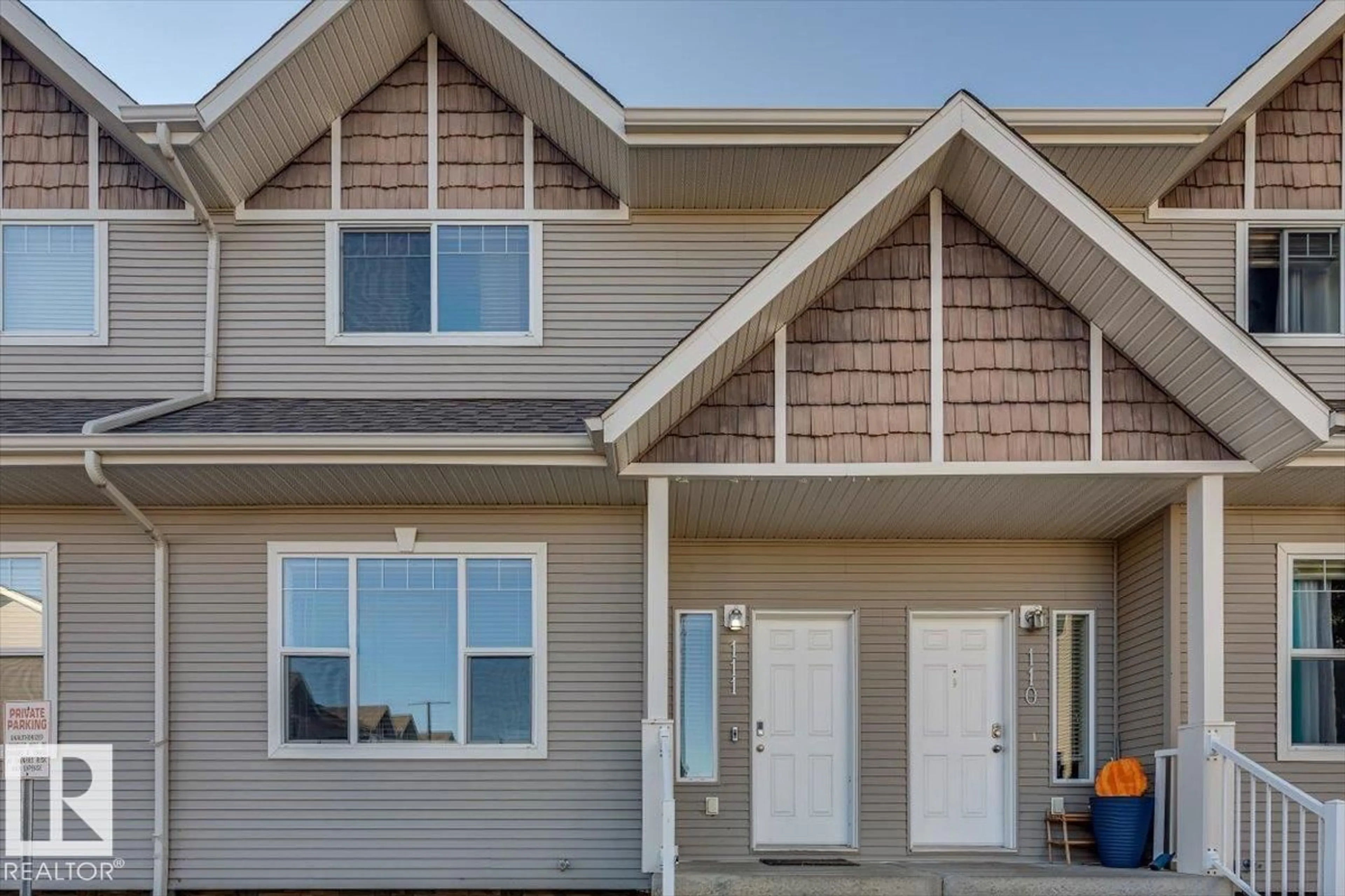 Home with vinyl exterior material, street for 50 - 111 LUCKY PL, Sylvan Lake Alberta T4S0E3