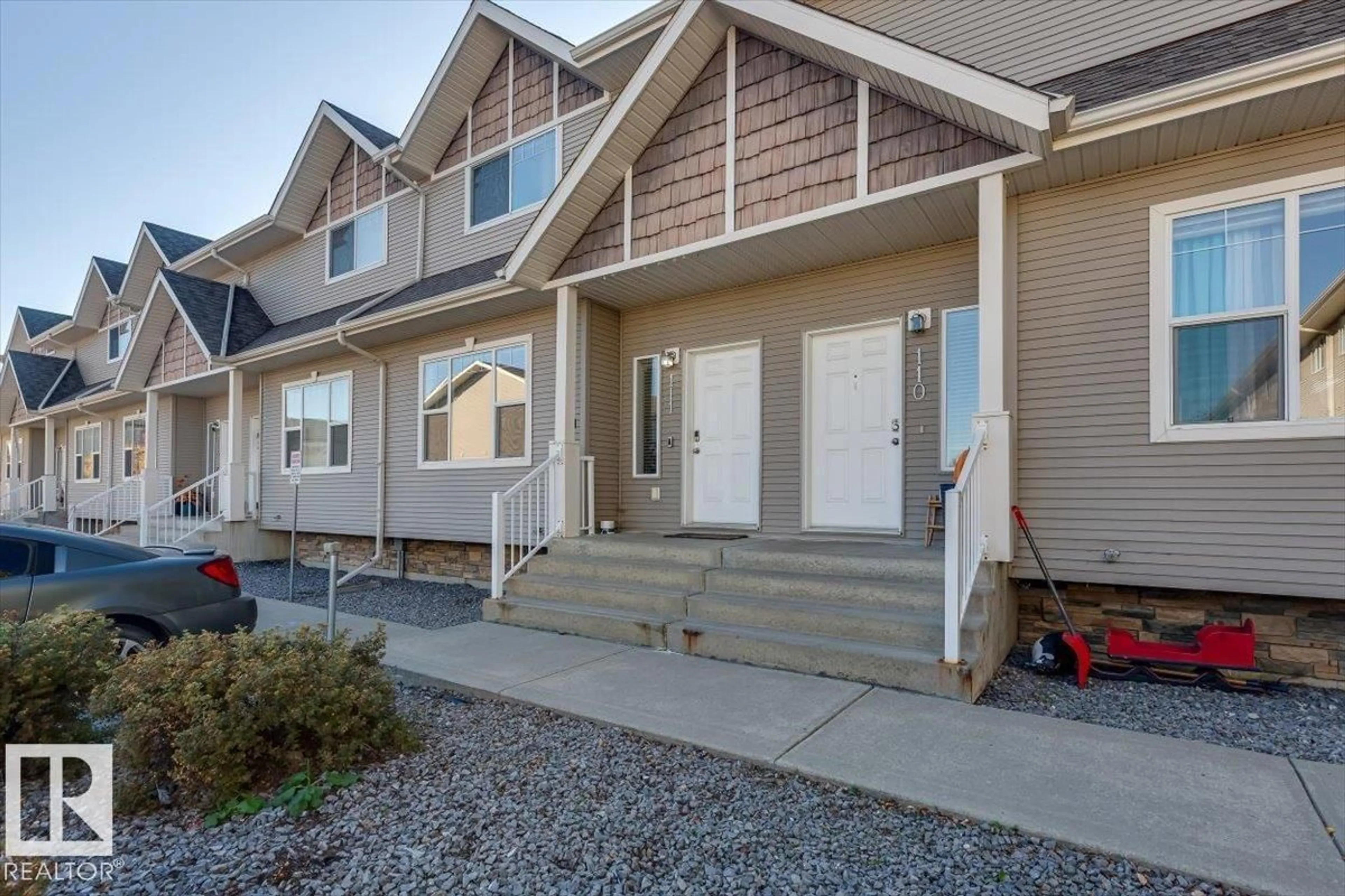 Home with vinyl exterior material, street for 50 - 111 LUCKY PL, Sylvan Lake Alberta T4S0E3
