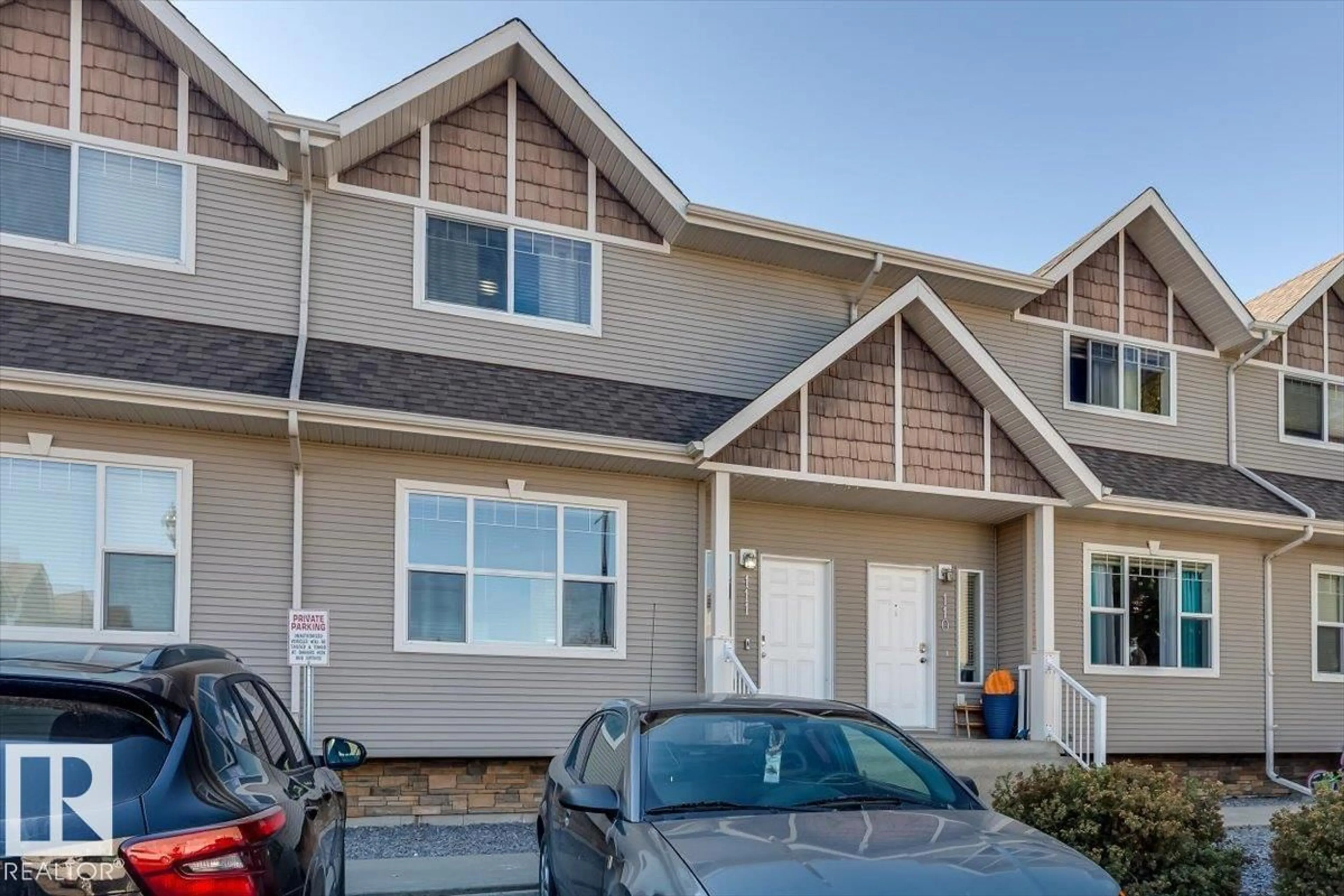 Home with vinyl exterior material, street for 50 - 111 LUCKY PL, Sylvan Lake Alberta T4S0E3