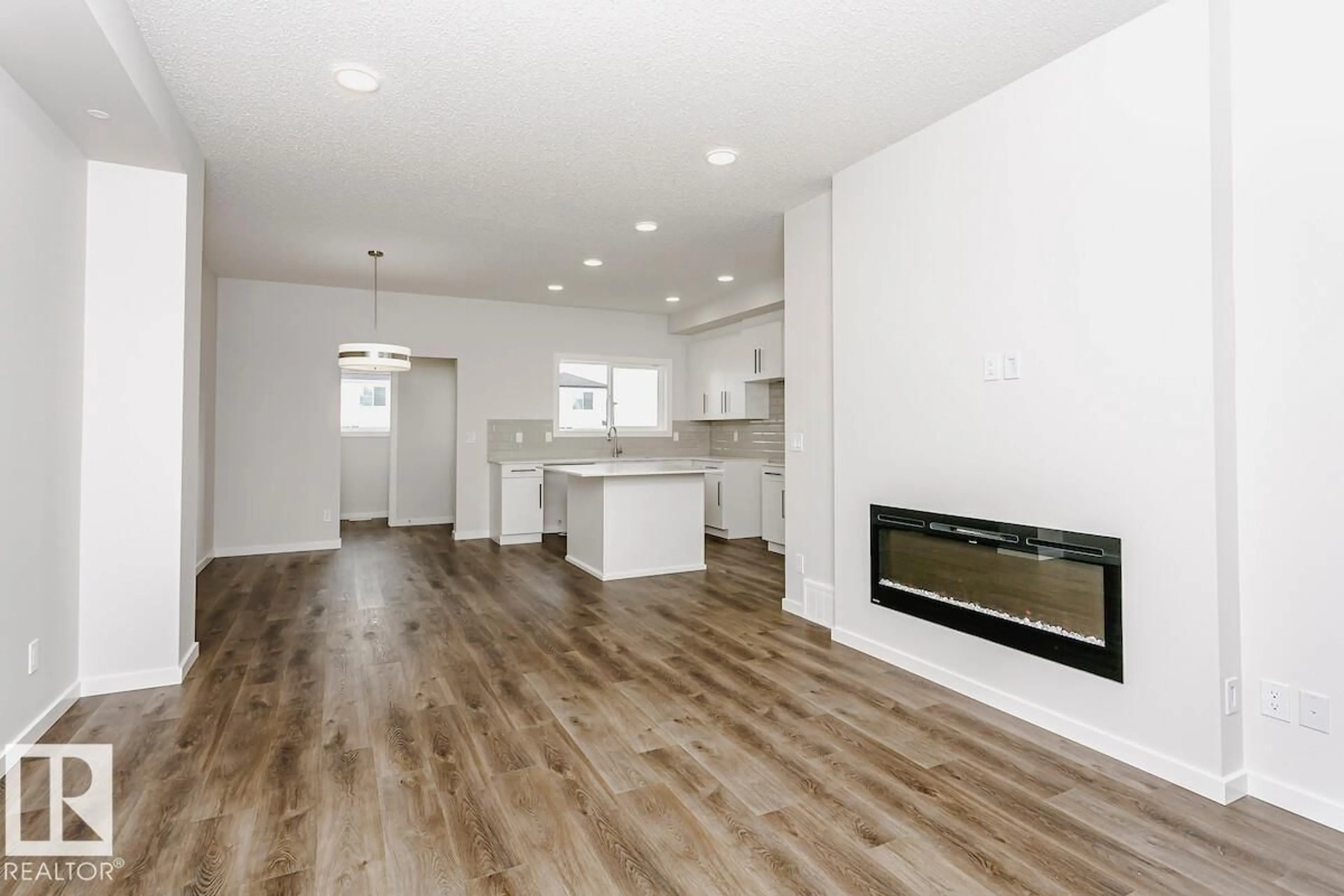 Open concept kitchen, wood/laminate floor for 18109 73A ST, Edmonton Alberta T5Z0J1