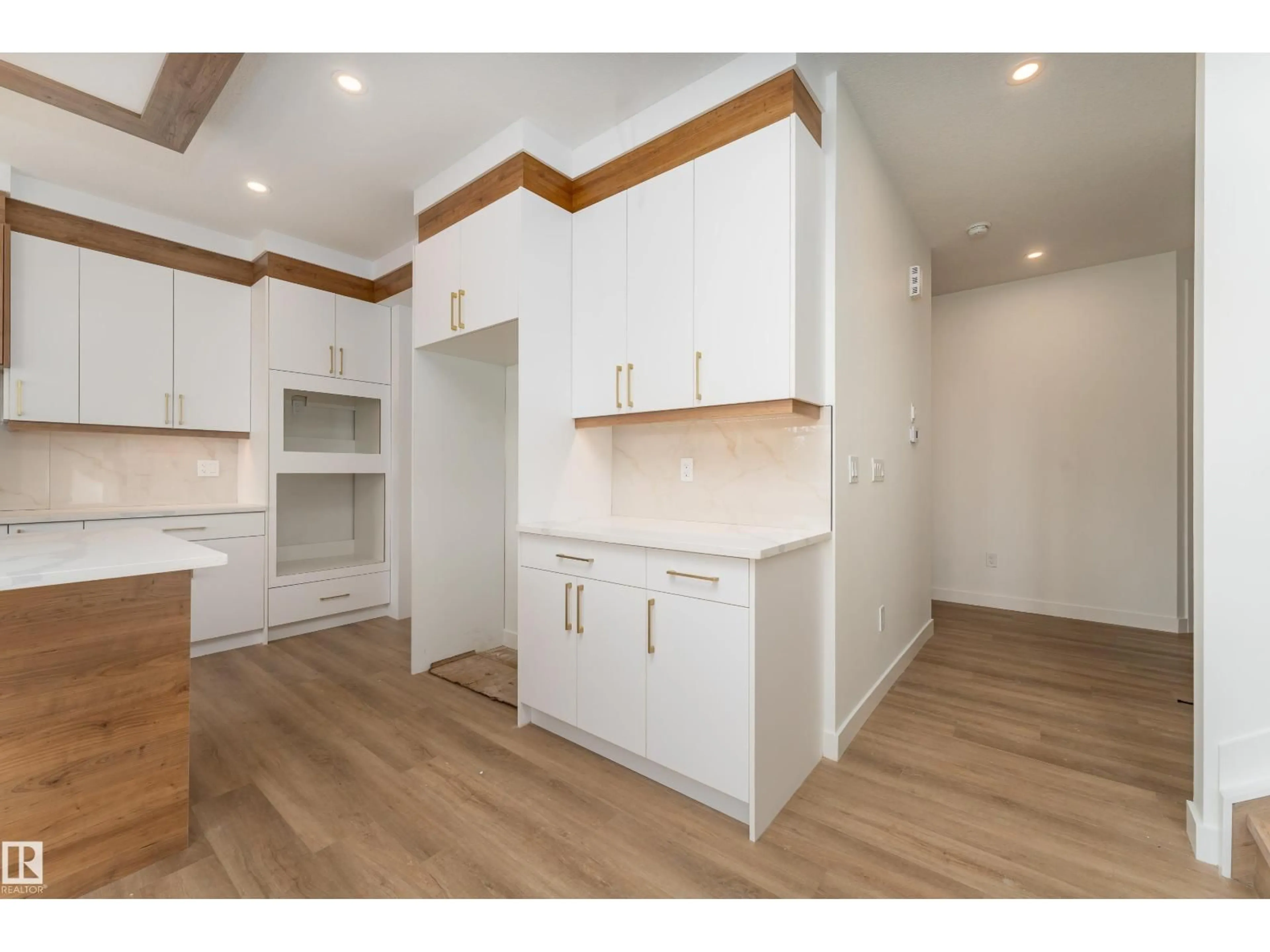 Open concept kitchen, wood/laminate floor for 3833 52 ST, Gibbons Alberta T0A1N0