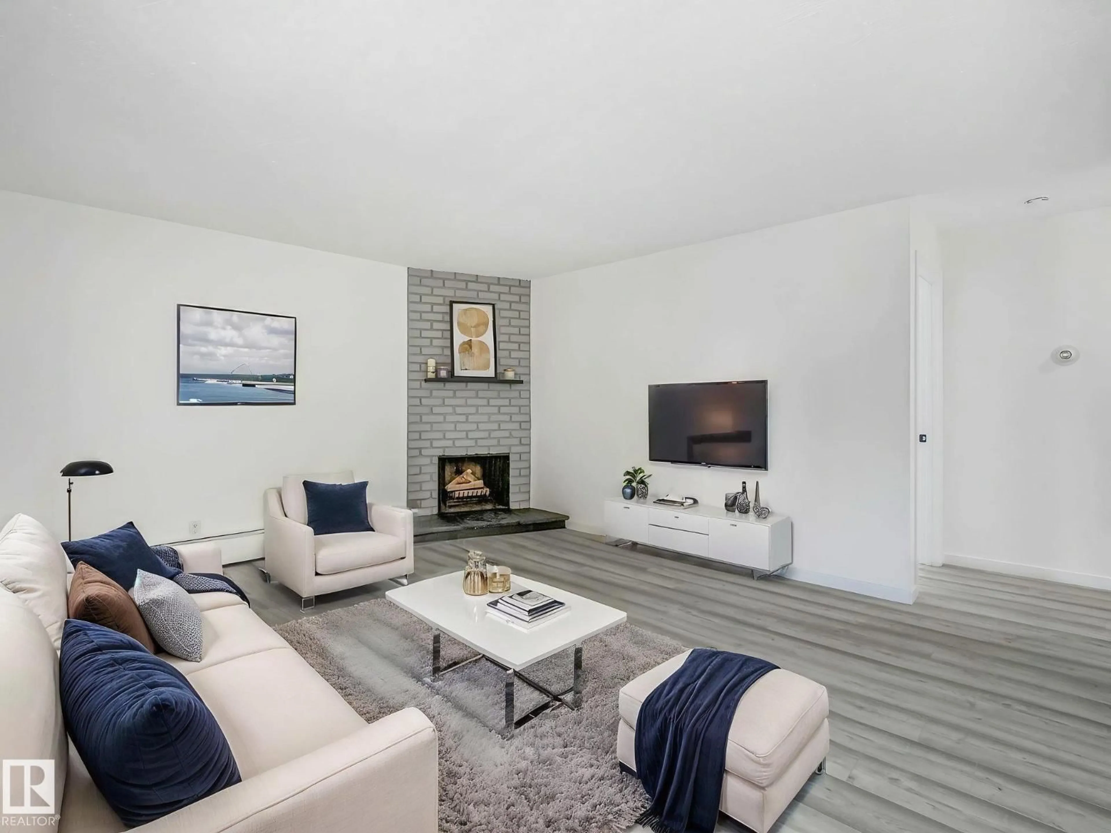 Living room with furniture, unknown for #104 - 10148 118 ST, Edmonton Alberta T5K1Y4