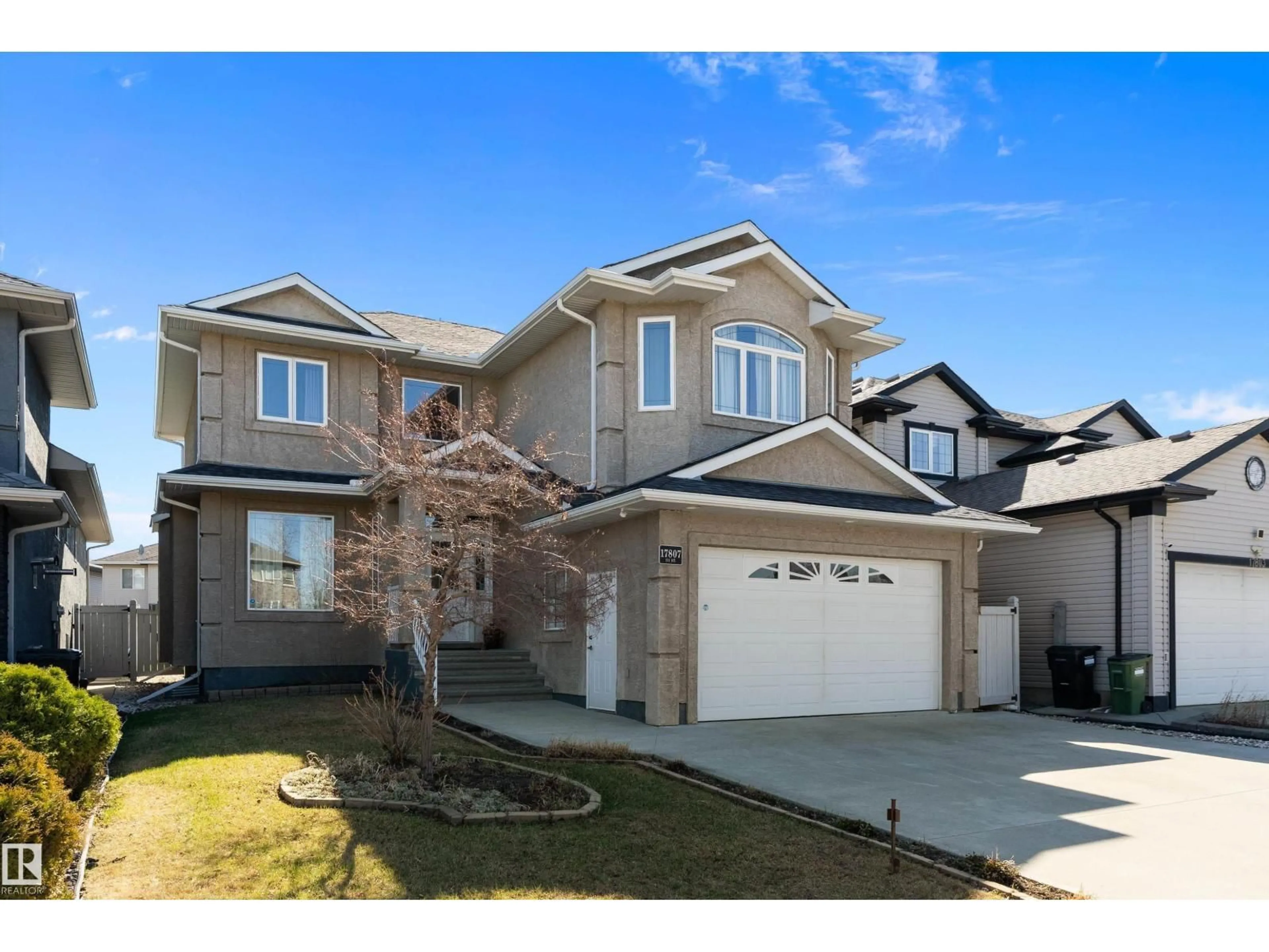 Home with vinyl exterior material, street for NW - 17807 111 ST, Edmonton Alberta T5X6J3