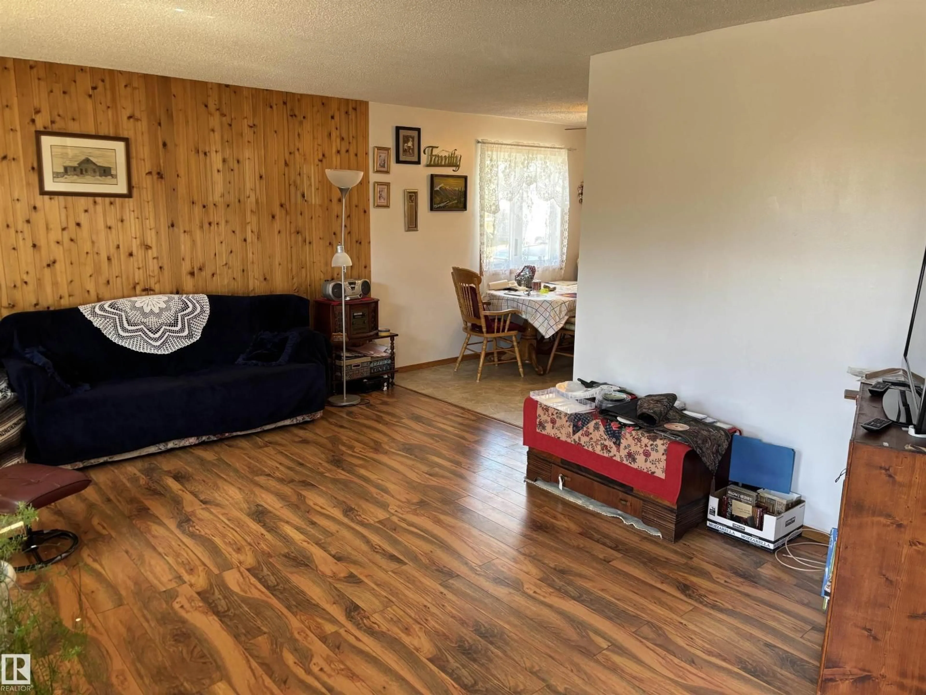 Living room with furniture, wood/laminate floor for 4824 49 AV, Sangudo Alberta T0E2A0