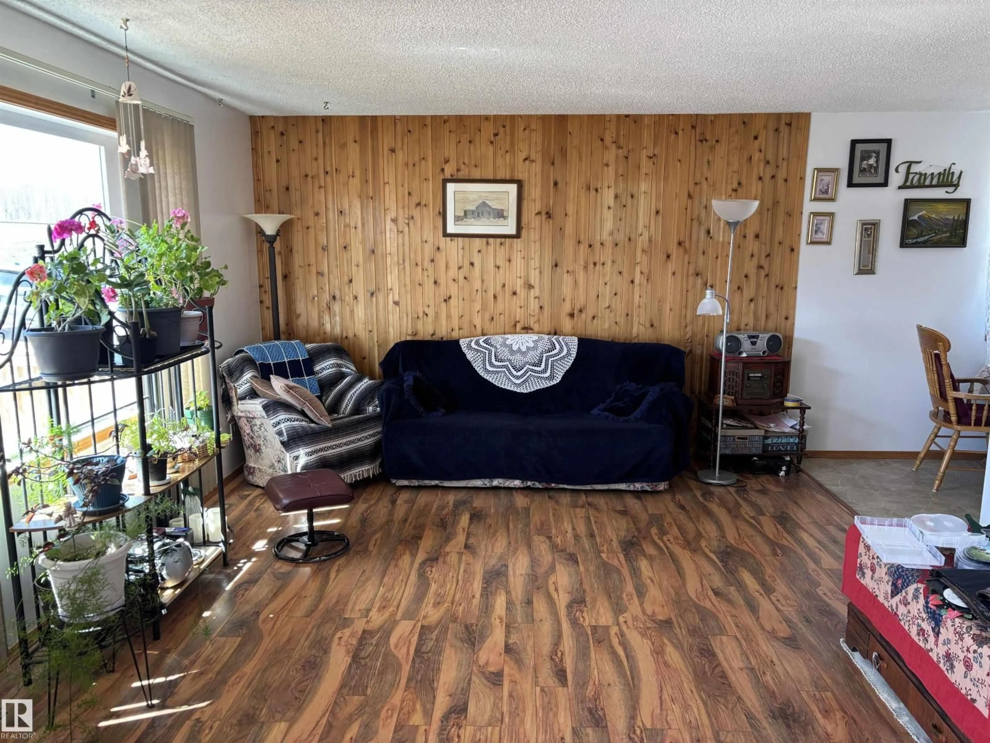Living room with furniture, wood/laminate floor for 4824 49 AV, Sangudo Alberta T0E2A0