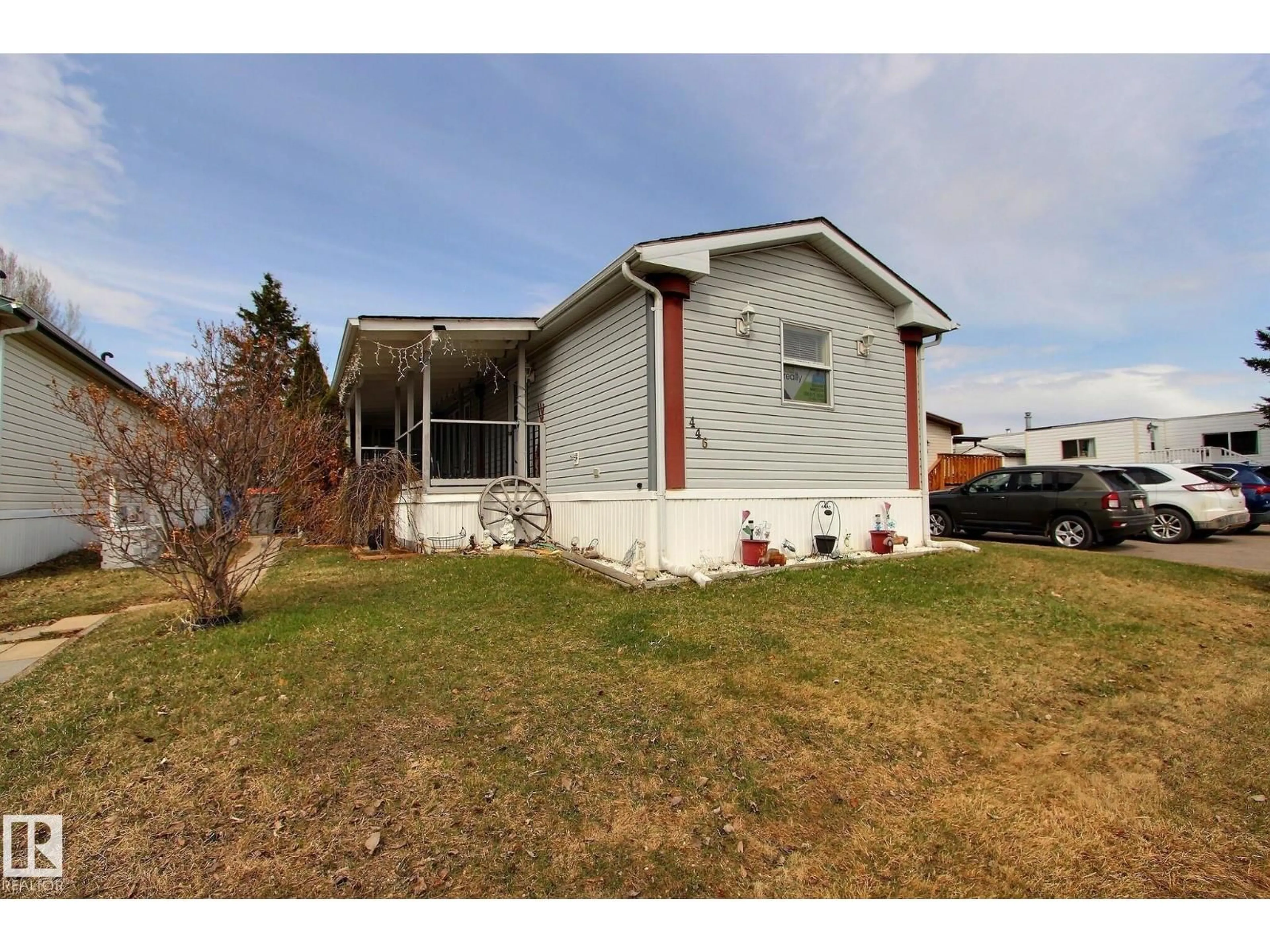 Home with vinyl exterior material, street for 446 - 53222 RR 272, Rural Parkland County Alberta T7X3P6