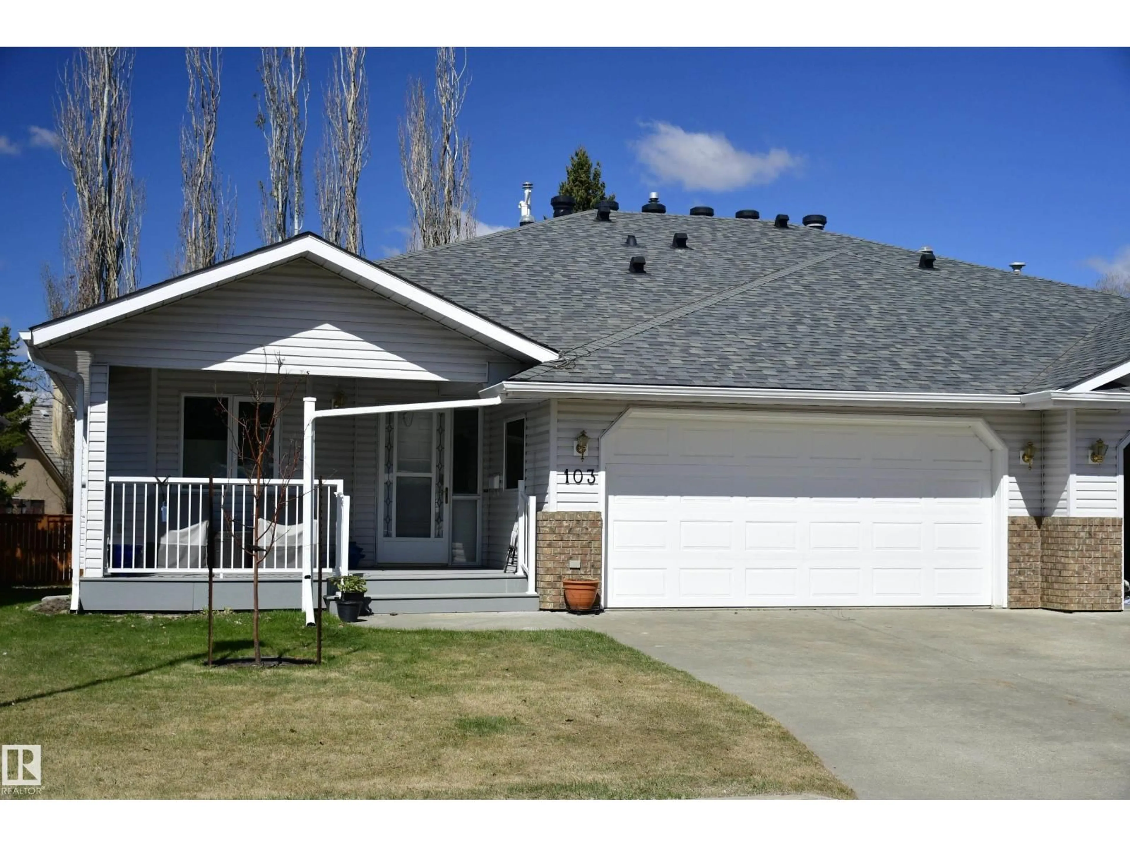 Home with vinyl exterior material, street for 103 LAKESIDE PL, Leduc Alberta T9E6P3