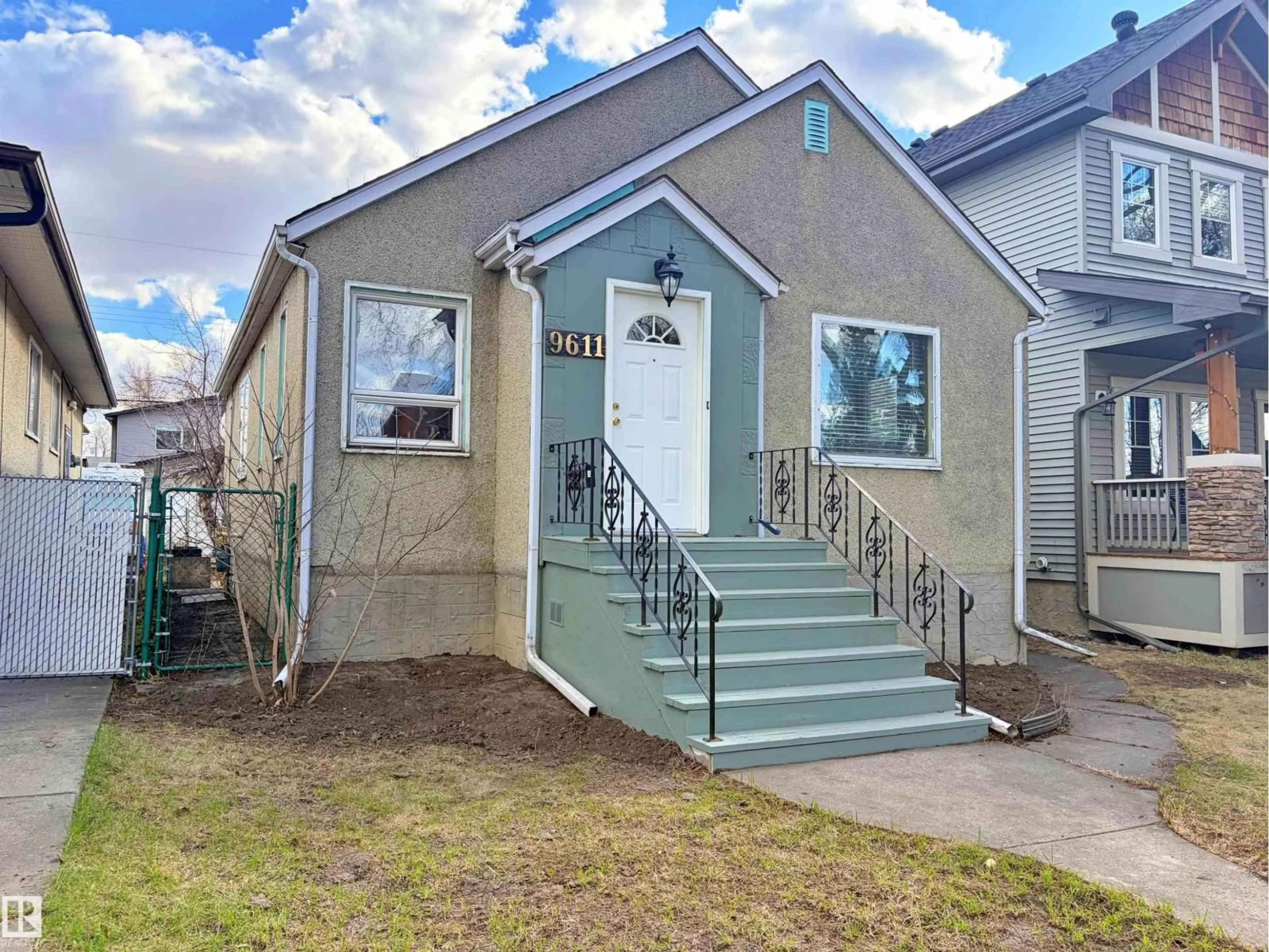 Home with vinyl exterior material, street for NW - 9611 81 AV, Edmonton Alberta T6C0X6