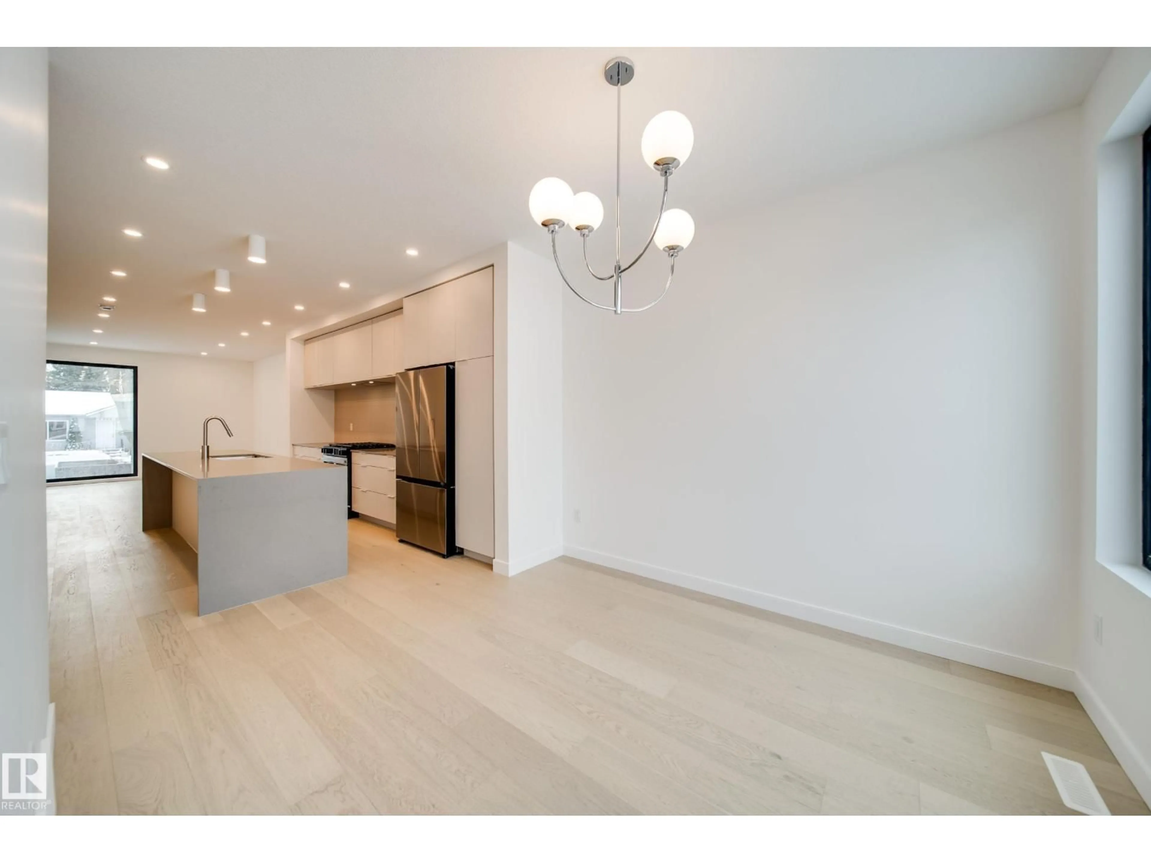 Open concept kitchen, unknown for 7538 80 AV, Edmonton Alberta T6C0S4