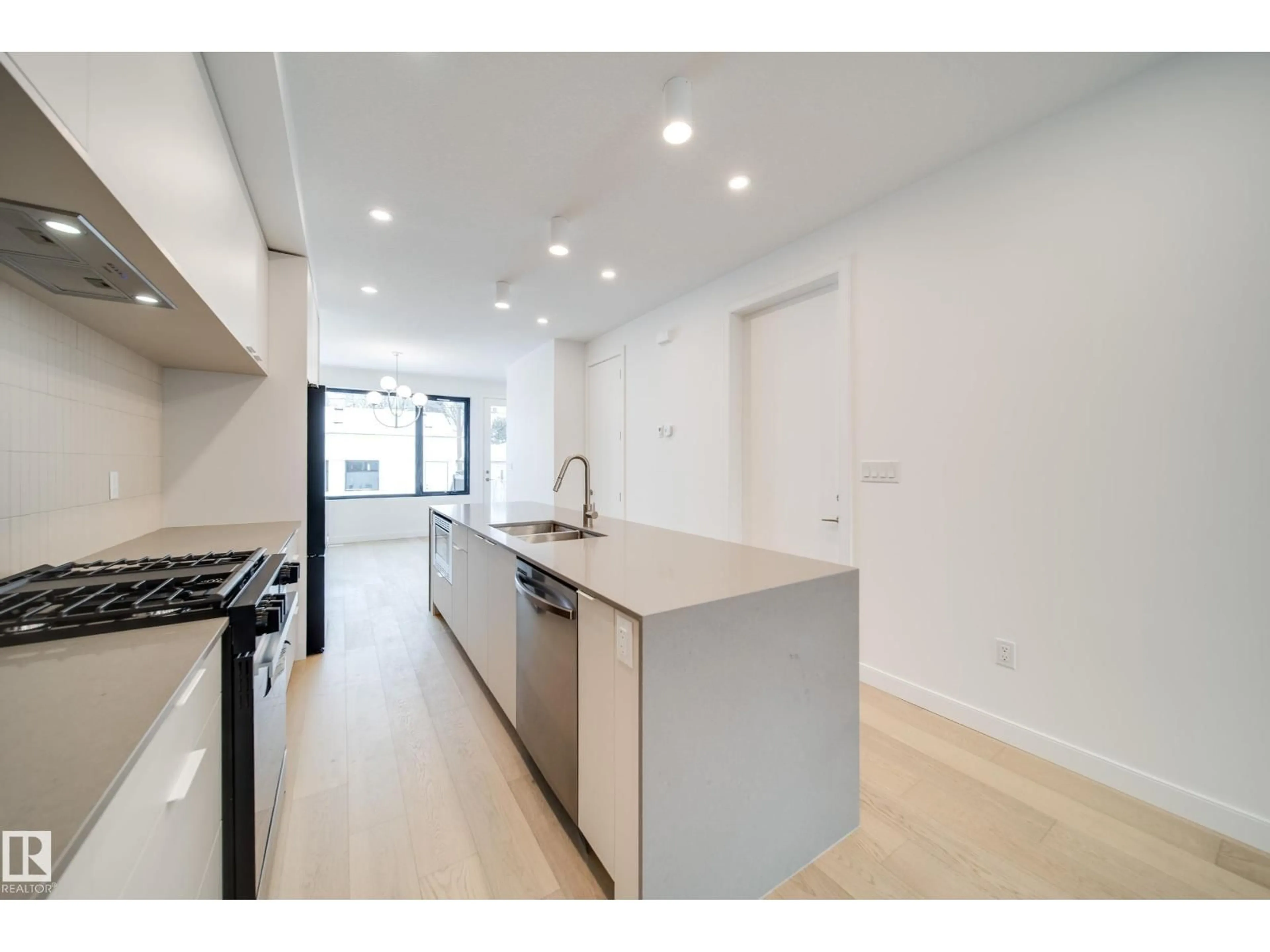 Open concept kitchen, unknown for 7538 80 AV, Edmonton Alberta T6C0S4