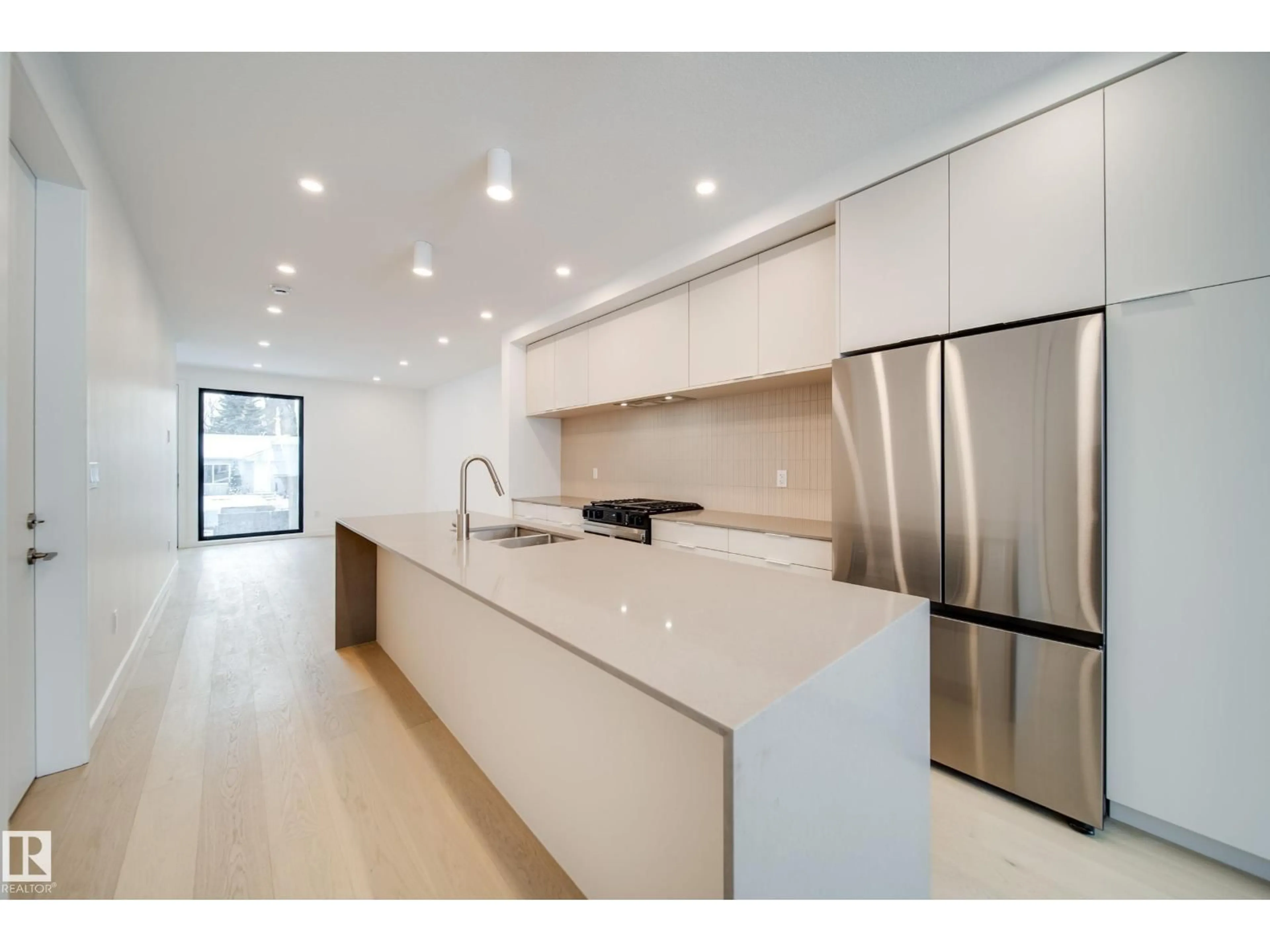 Open concept kitchen, unknown for 7538 80 AV, Edmonton Alberta T6C0S4
