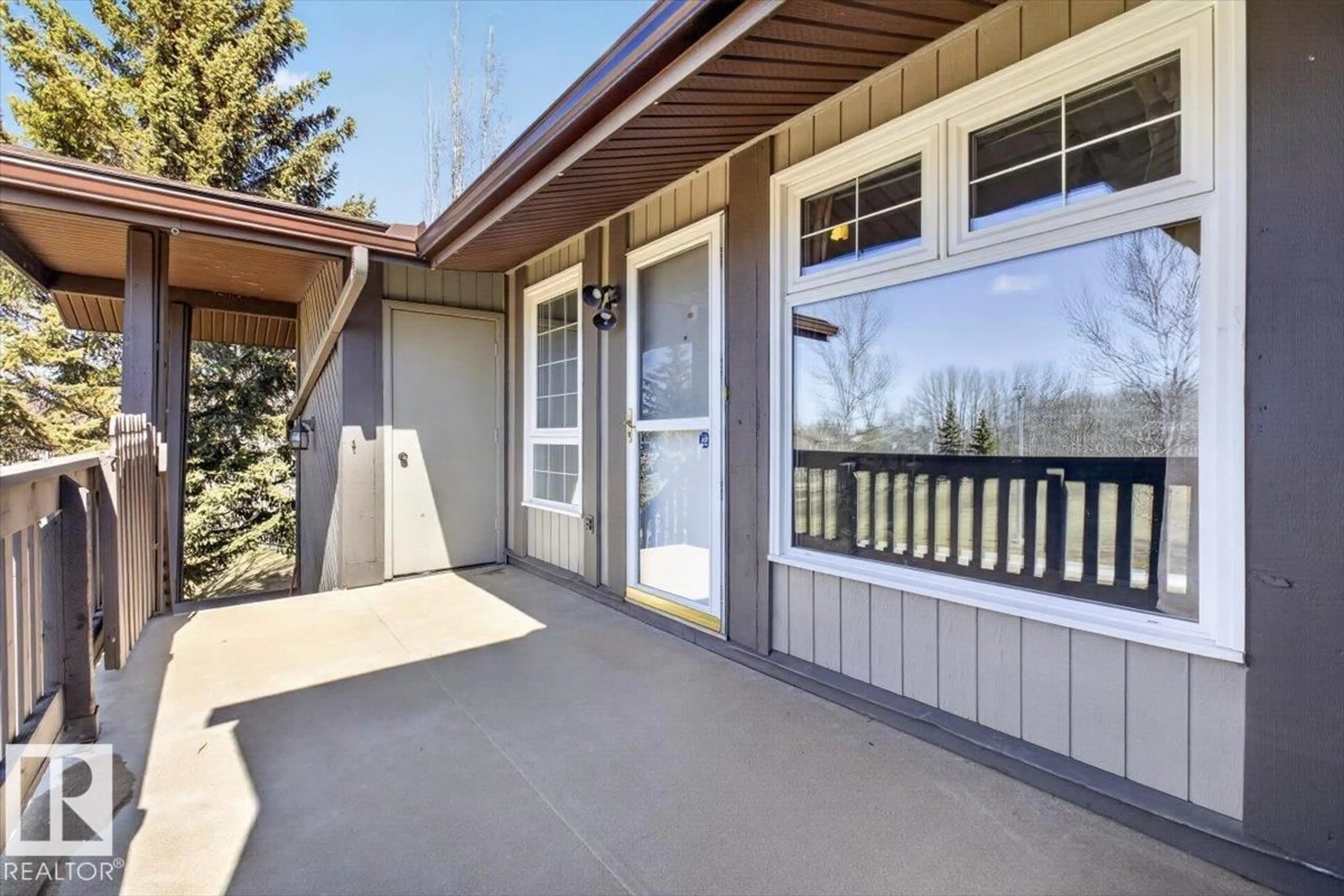 Home with vinyl exterior material, street for NW - 5780 172 ST, Edmonton Alberta T6M1O4