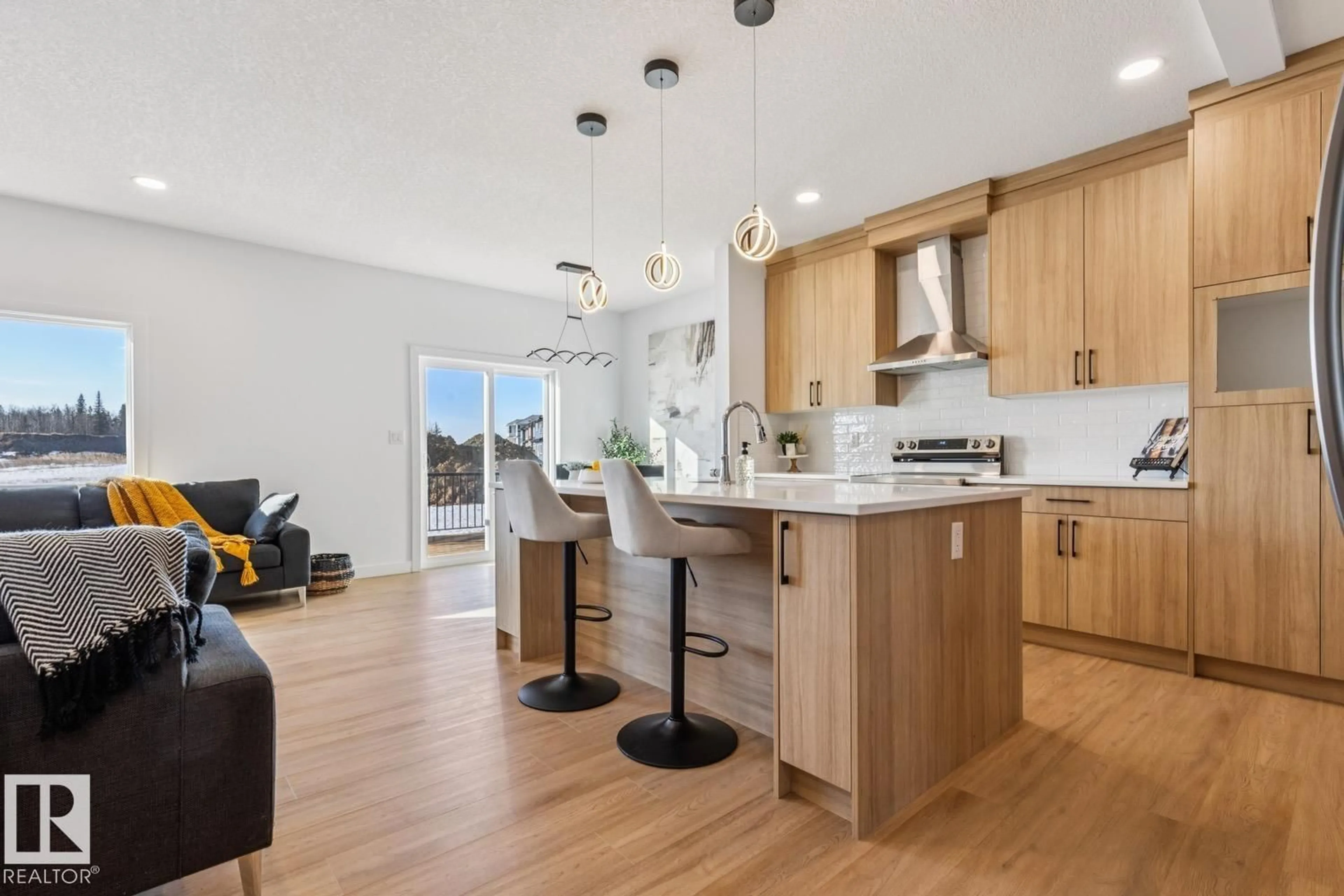 Open concept kitchen, wood/laminate floor for 39 CALEDON CR, Spruce Grove Alberta T7X0Y8