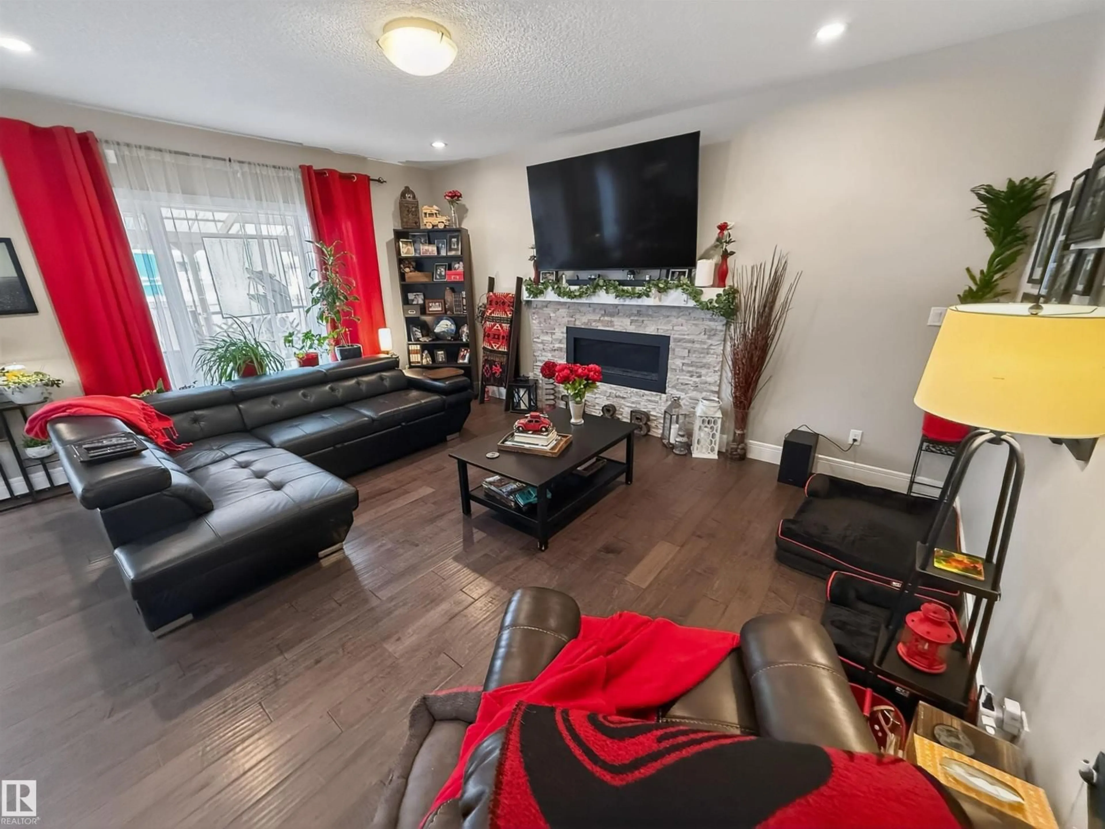 Living room with furniture, wood/laminate floor for 23 DILLWORTH CR, Spruce Grove Alberta T7X0E6